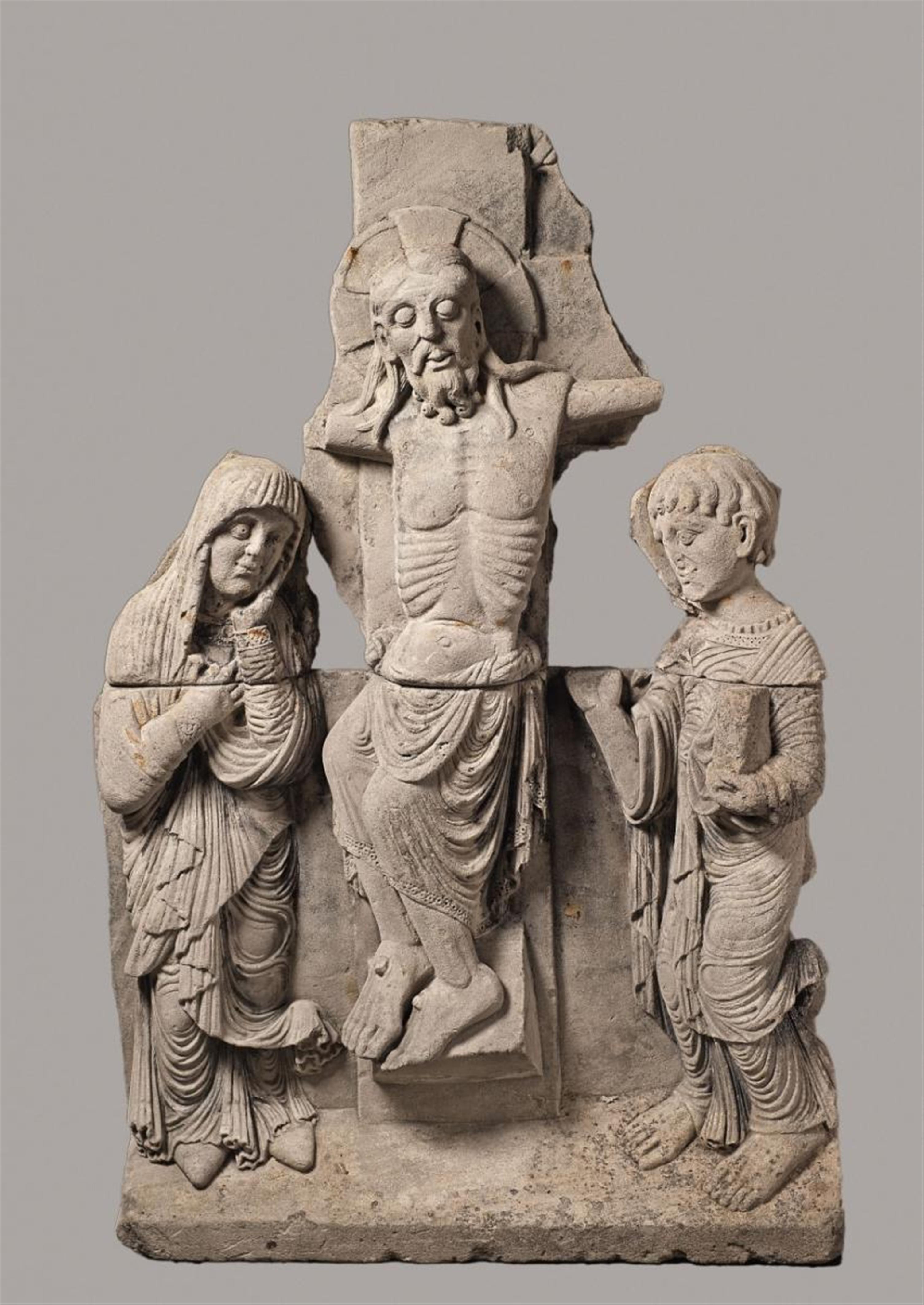 A PROBABLY FRENCH LIMESTONE CRUCIFIXION GROUP IN THE STYLE OF THE LATE 12TH CENTURY - image-1