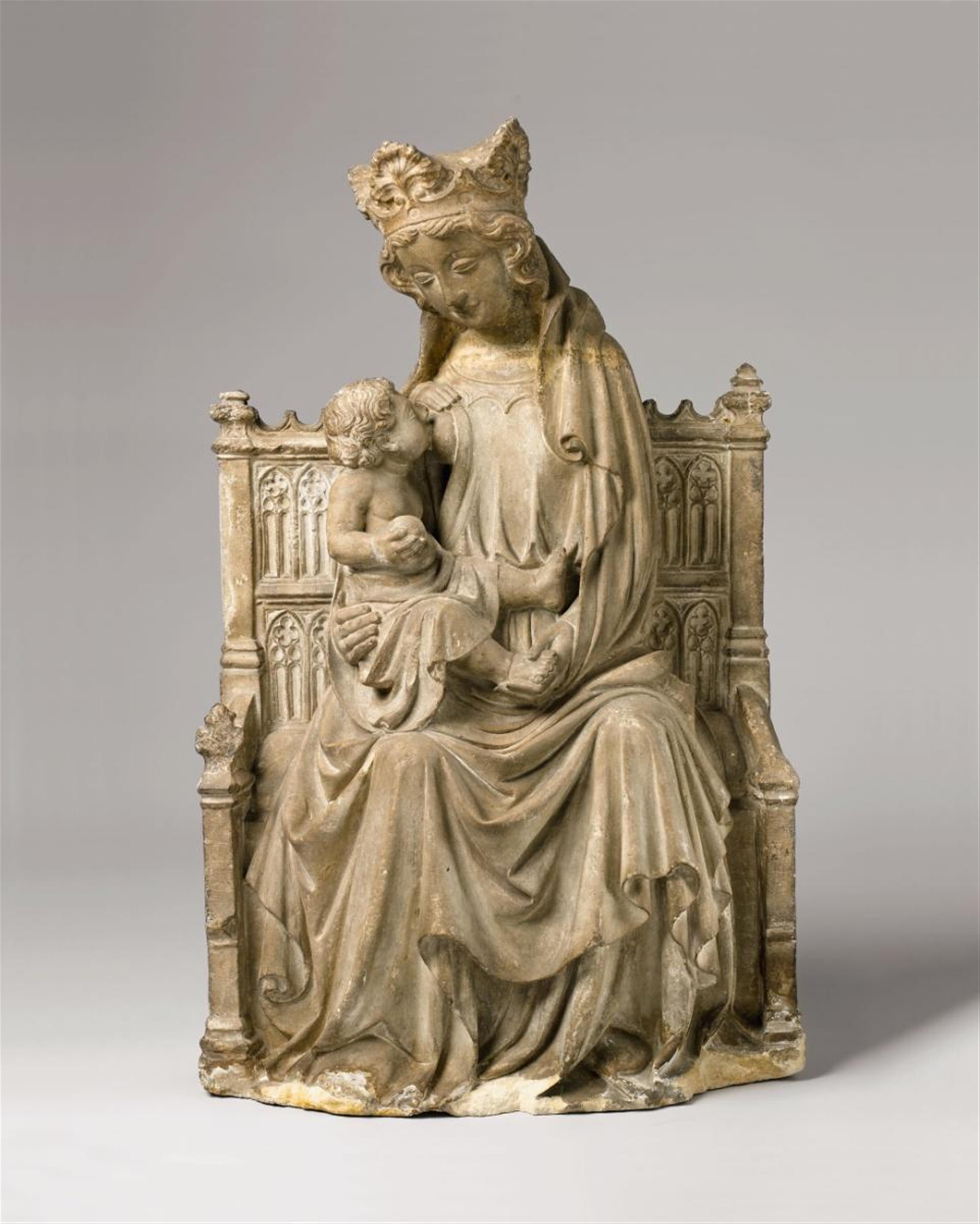 A NORTHERN FRENCH LIMESTONE FIGURE OF THE ENTHRONED NURSING VIRGIN CIRCA 1380/1390 - image-1