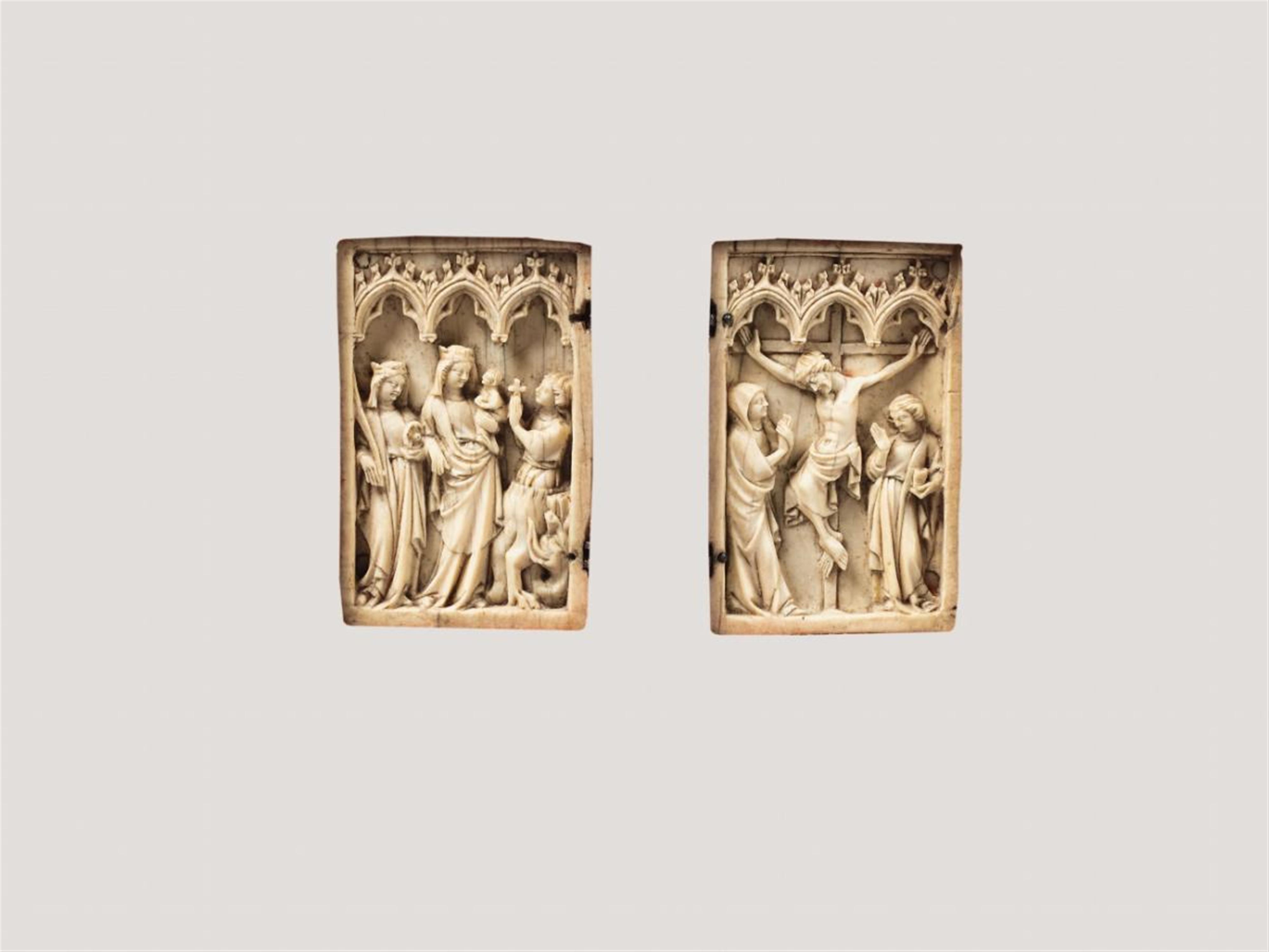 A LATE 14TH CENTURY NORTHERN FRENCH IVORY DIPTYCH SHOWING THE CRUCIFIXION AND THE VIRGIN - image-1