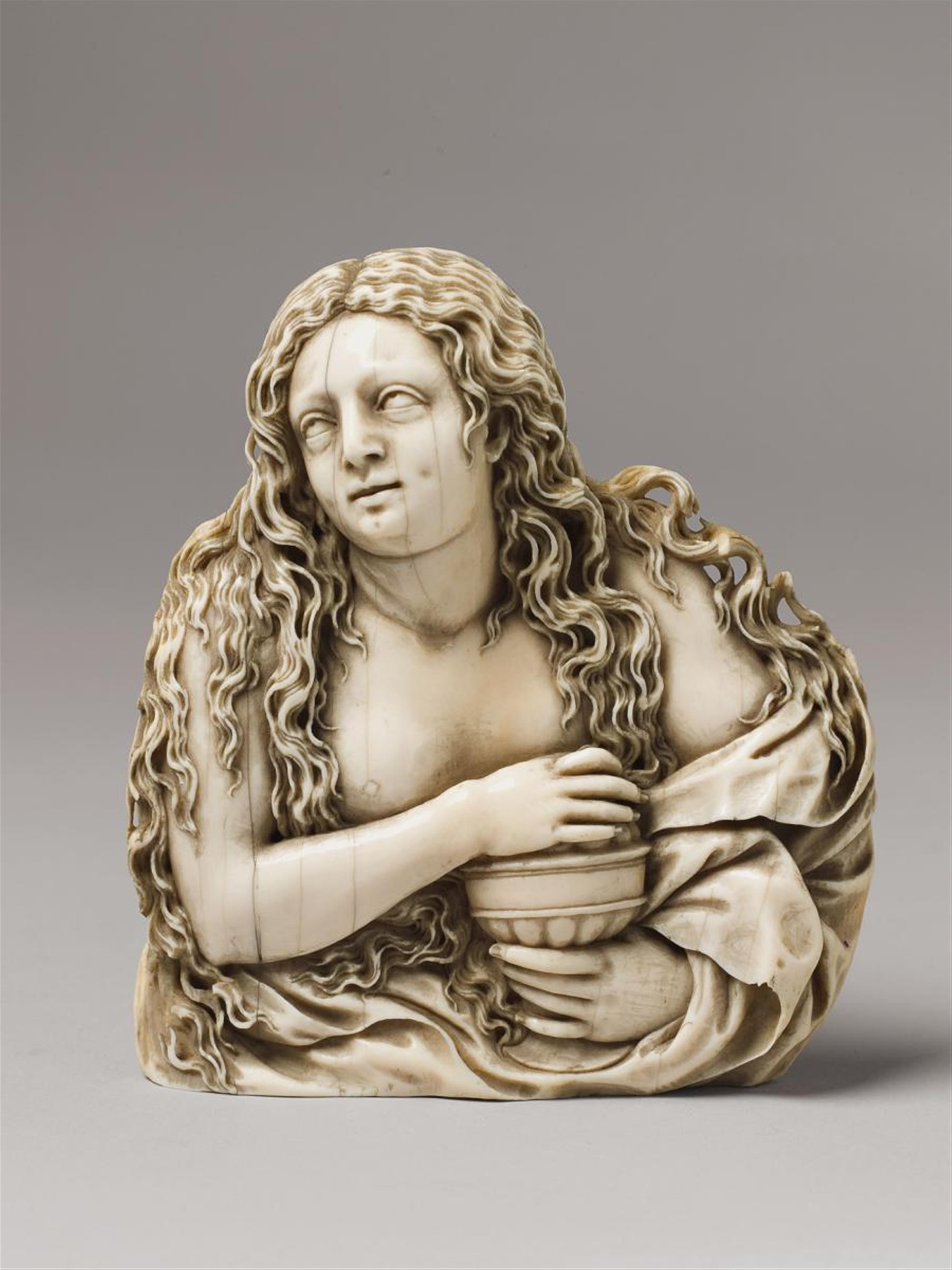 A MID 17TH CENTURY SOUTH GERMAN CARVED IVORY RELIEF OF SAINT MARY MAGDALENE - image-1