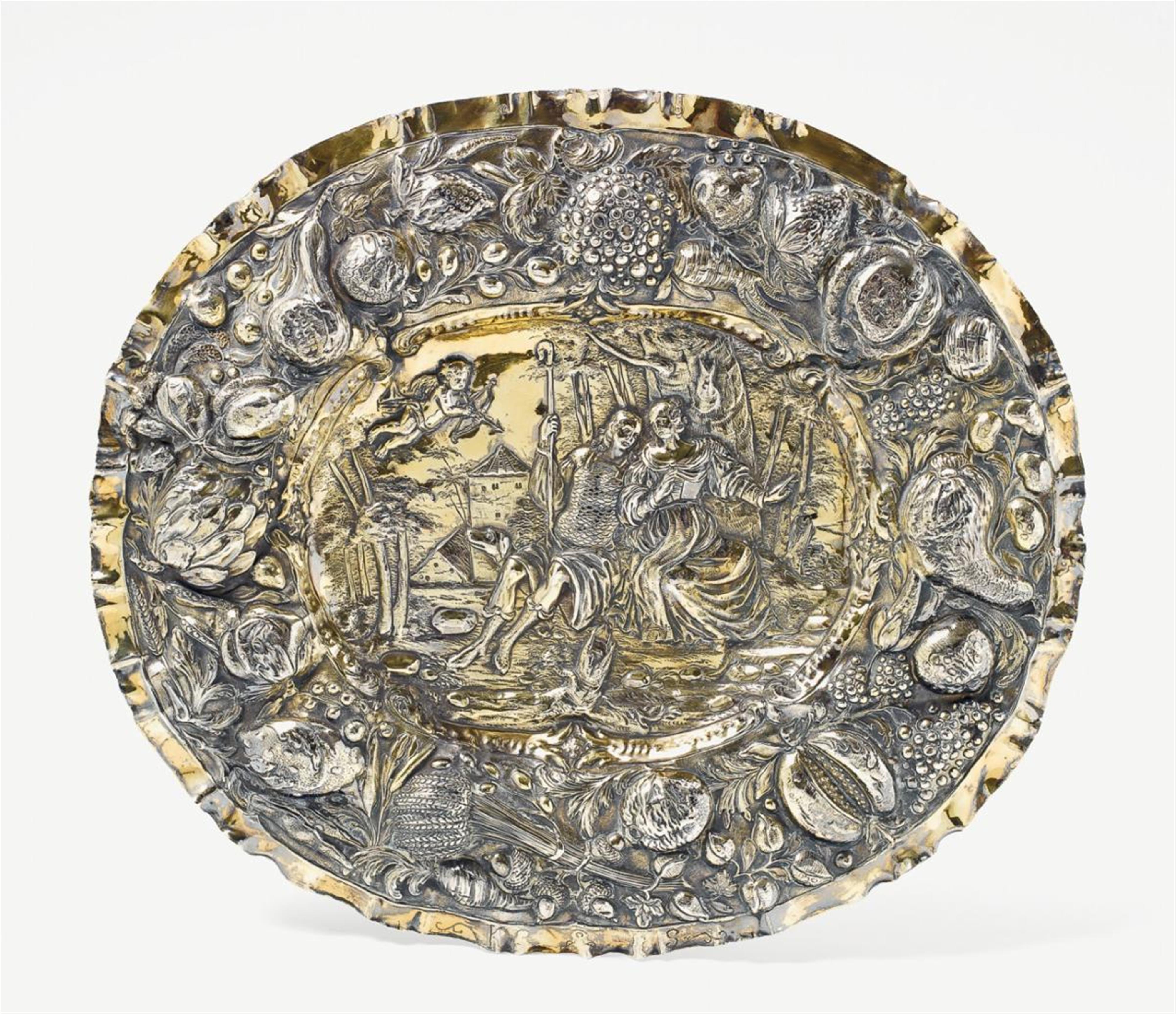 An Augsburg silver gilt sideboard dish; monogrammed "KS". Marks of Heinrich Mannlich, 1679 - 83. - image-1