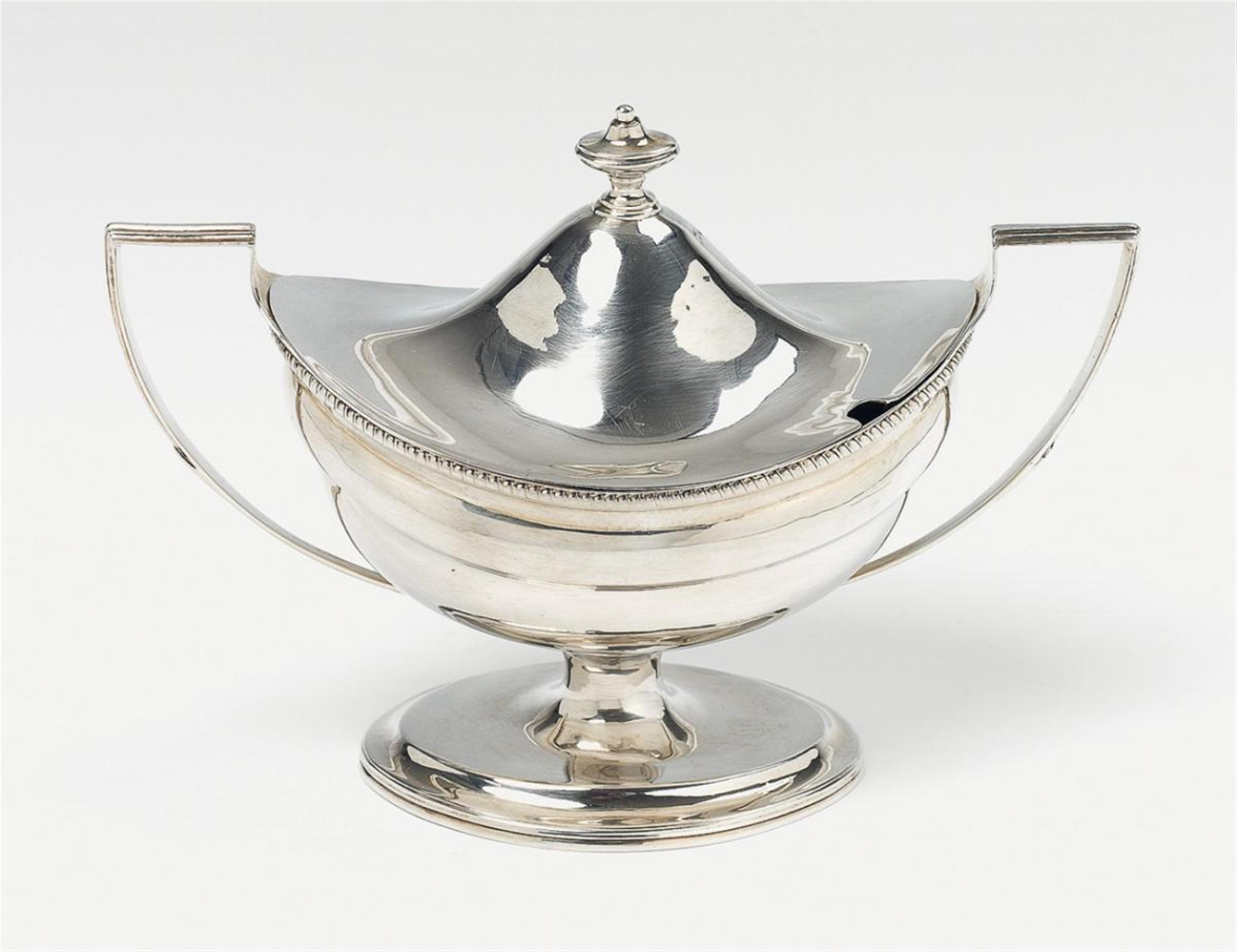 A George III Newcastle silver sauce boat and cover. Marks of Ann Robertson, 1803 - 20. - image-1