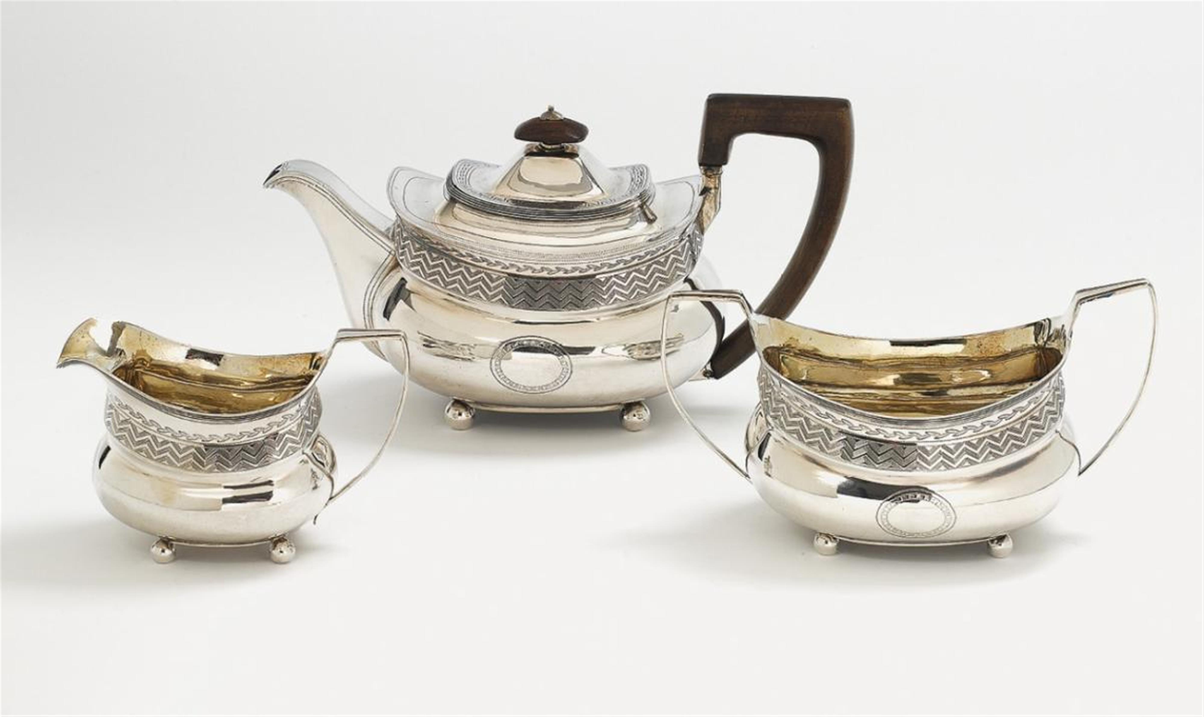 A George III London silver tea service. Comprising teapot, sugar bowl and milk jug, monogrammed "K". Marks of Alice & George Burrows II, 1805. - image-1