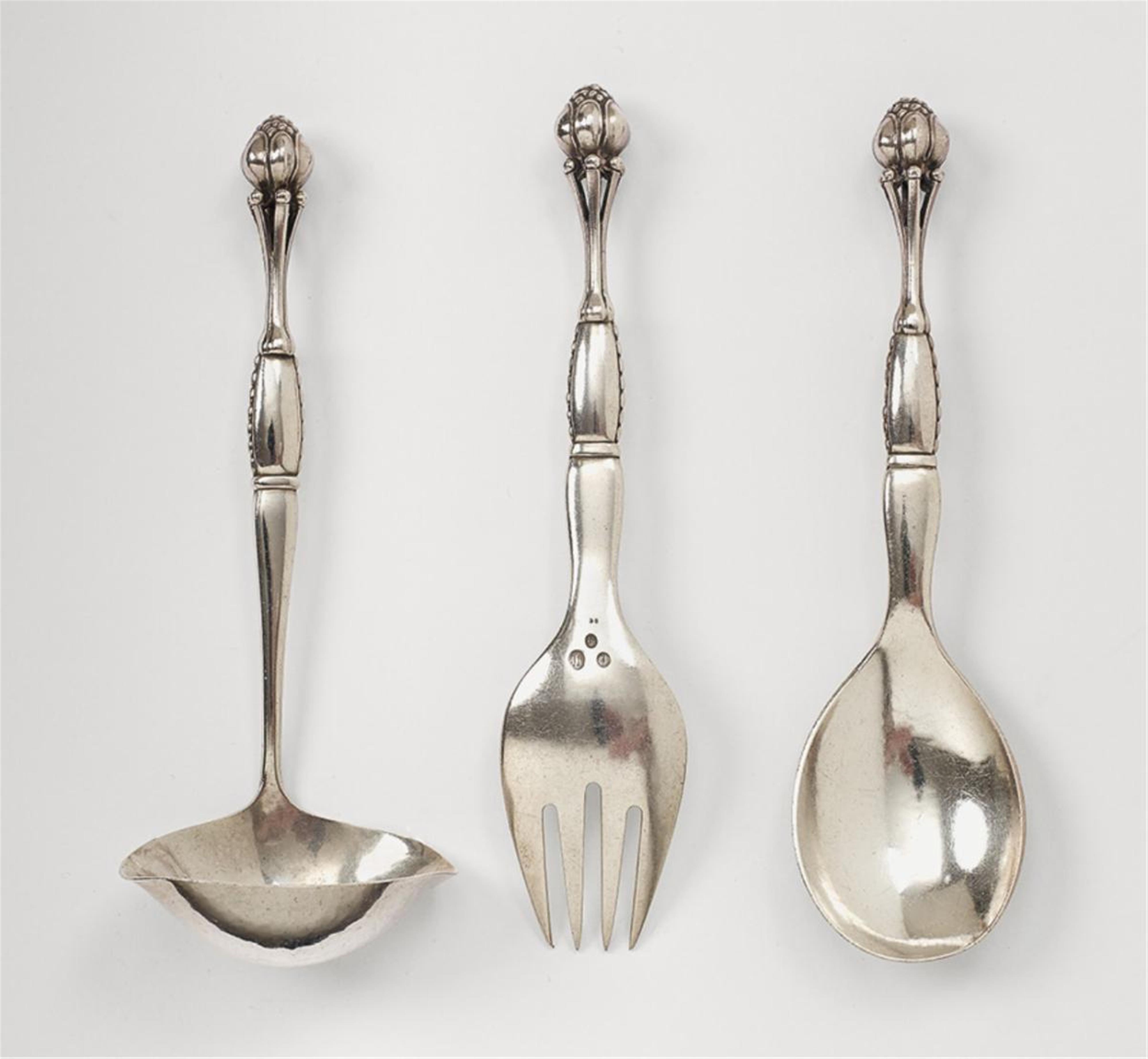 Three silver serving pieces no. 38. Comprising sauce ladle, serving spoon and fork. Marks of Georg Jensen, designed in 1912, made from 1927 - 30. - image-1
