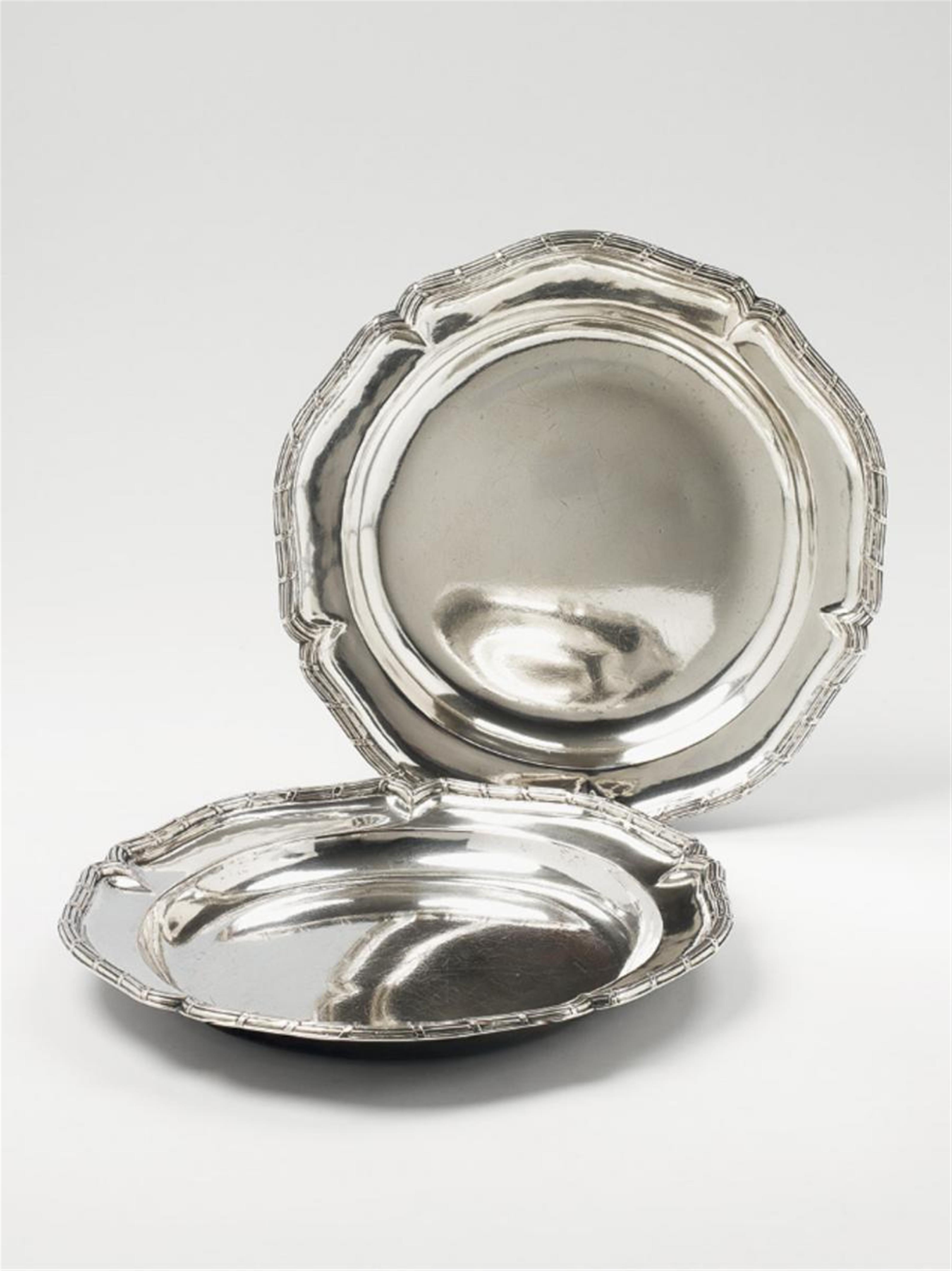 A pair of German silver deep platters. With probably later marks in the manner of Augsburg, mid 18th C. - image-1
