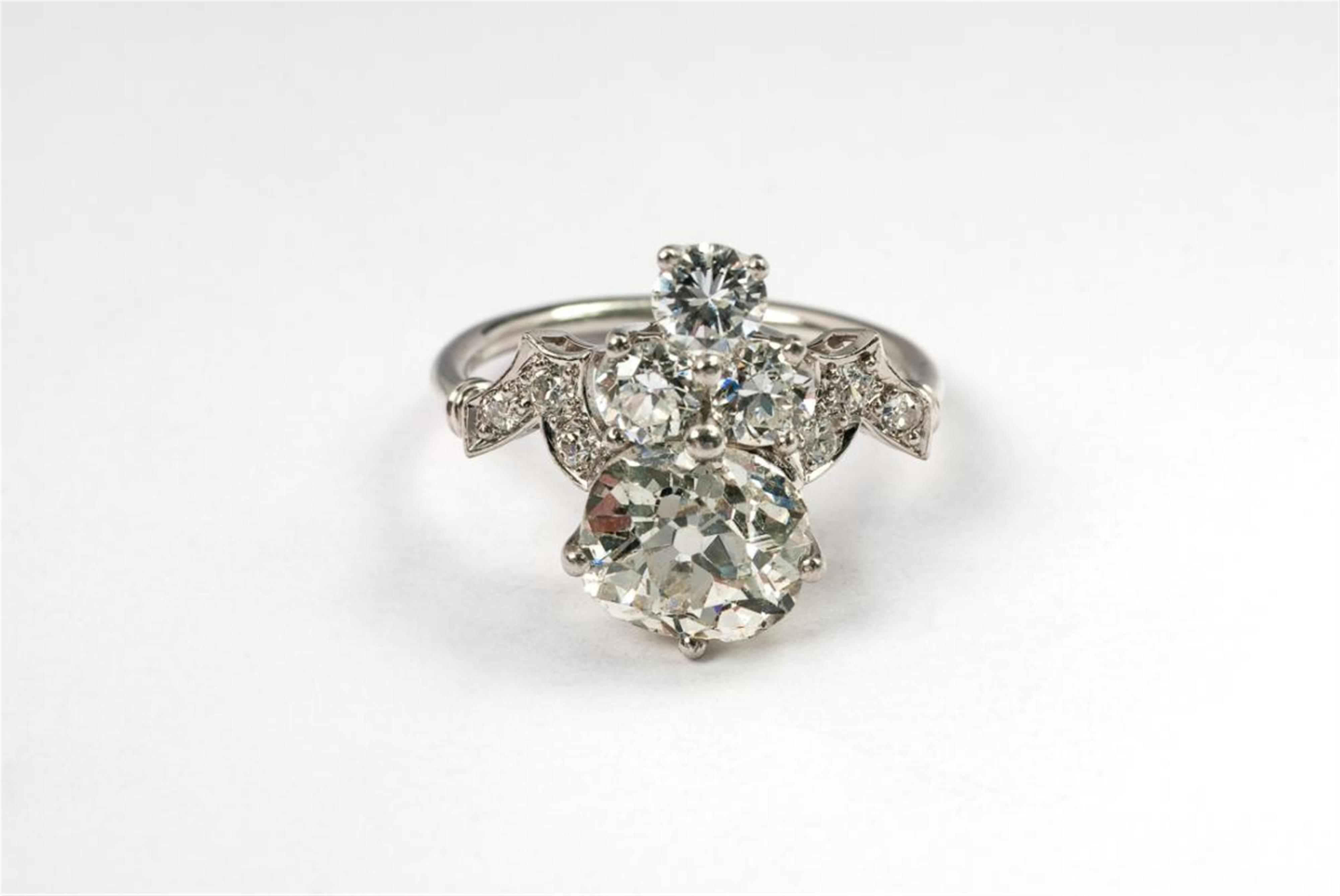 A diamond and platinum ring. - image-3