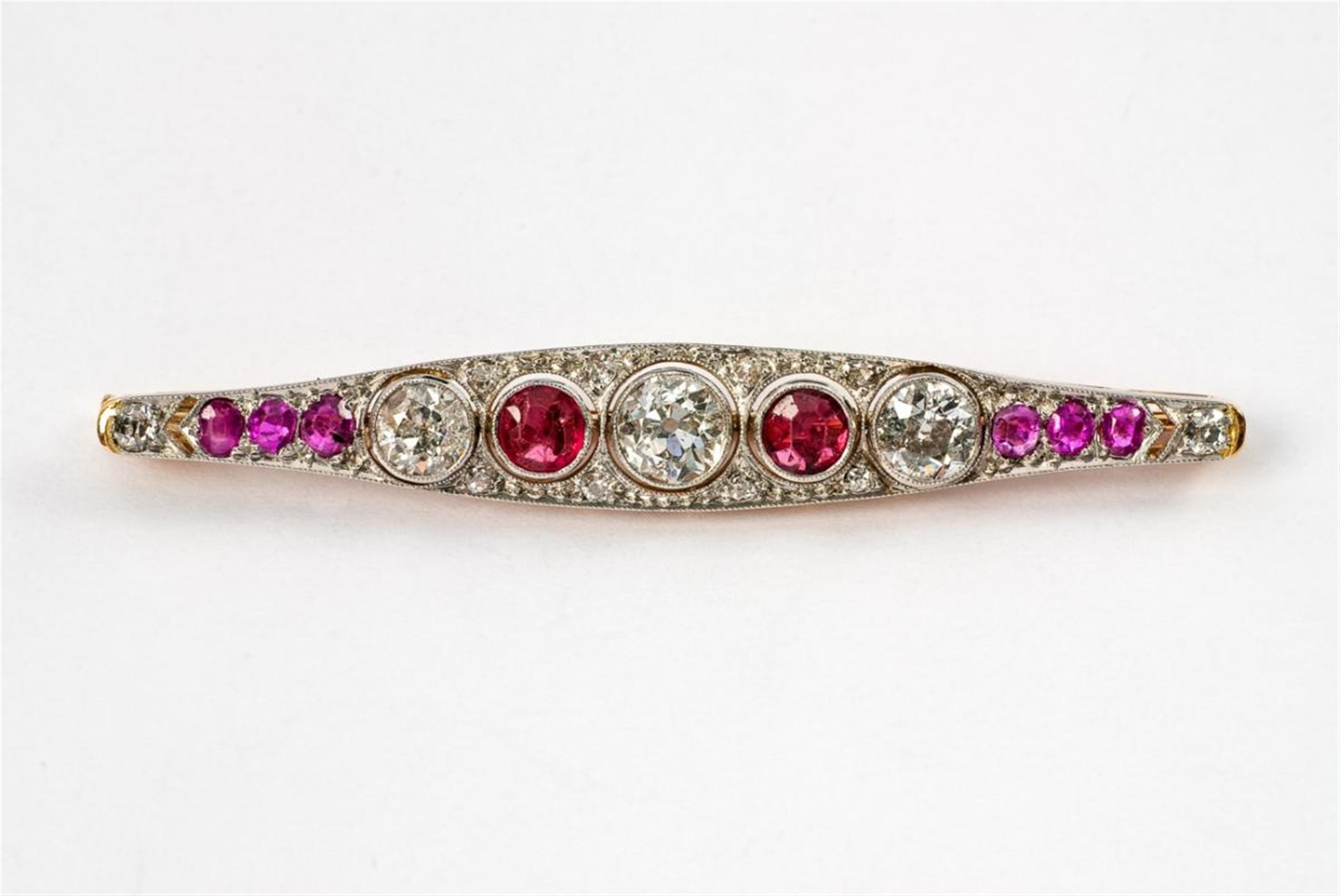 A 14 ct gold, ruby and diamond bar brooch. - image-1
