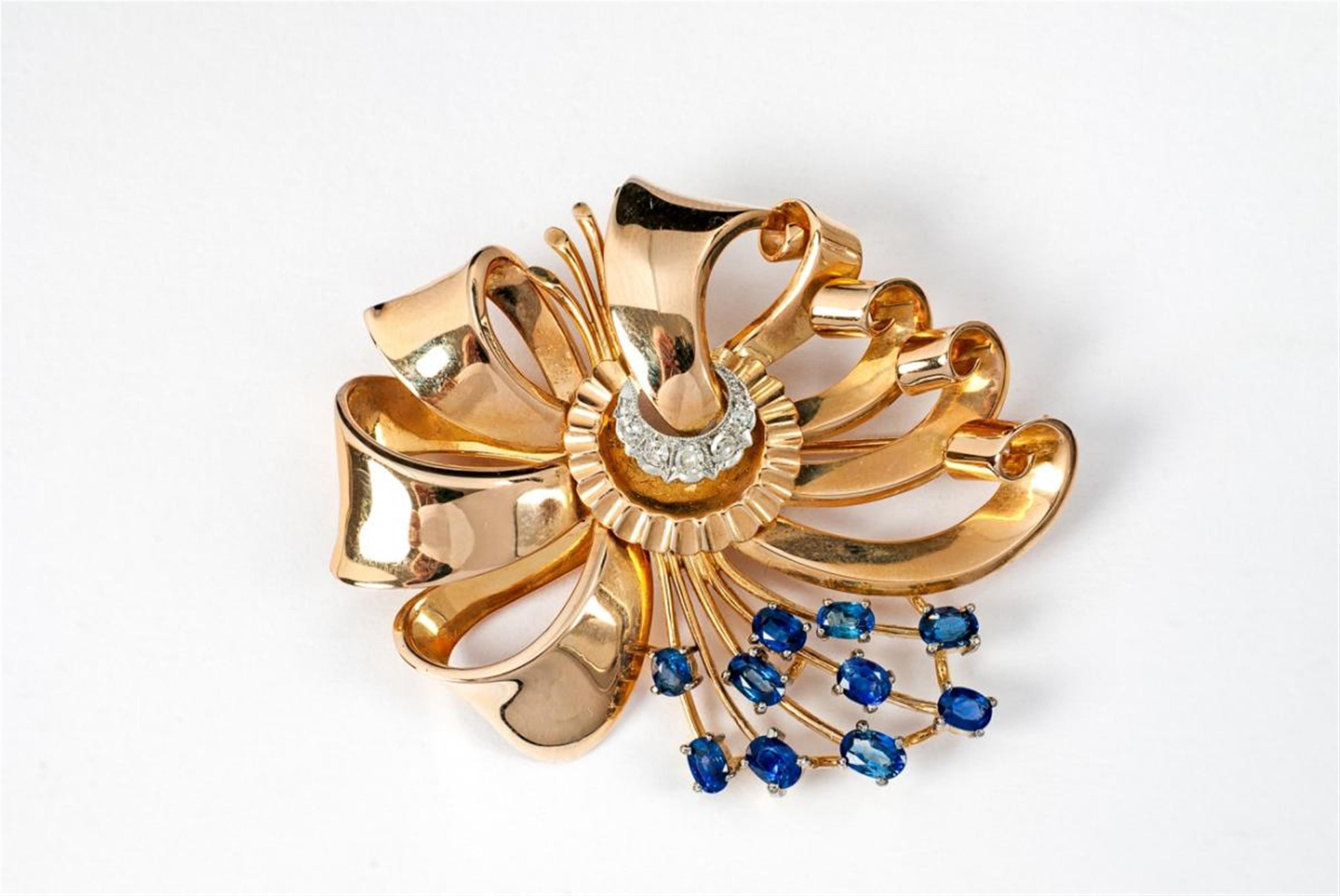 An 18 ct gold, sapphire and diamond bow-brooch. - image-1