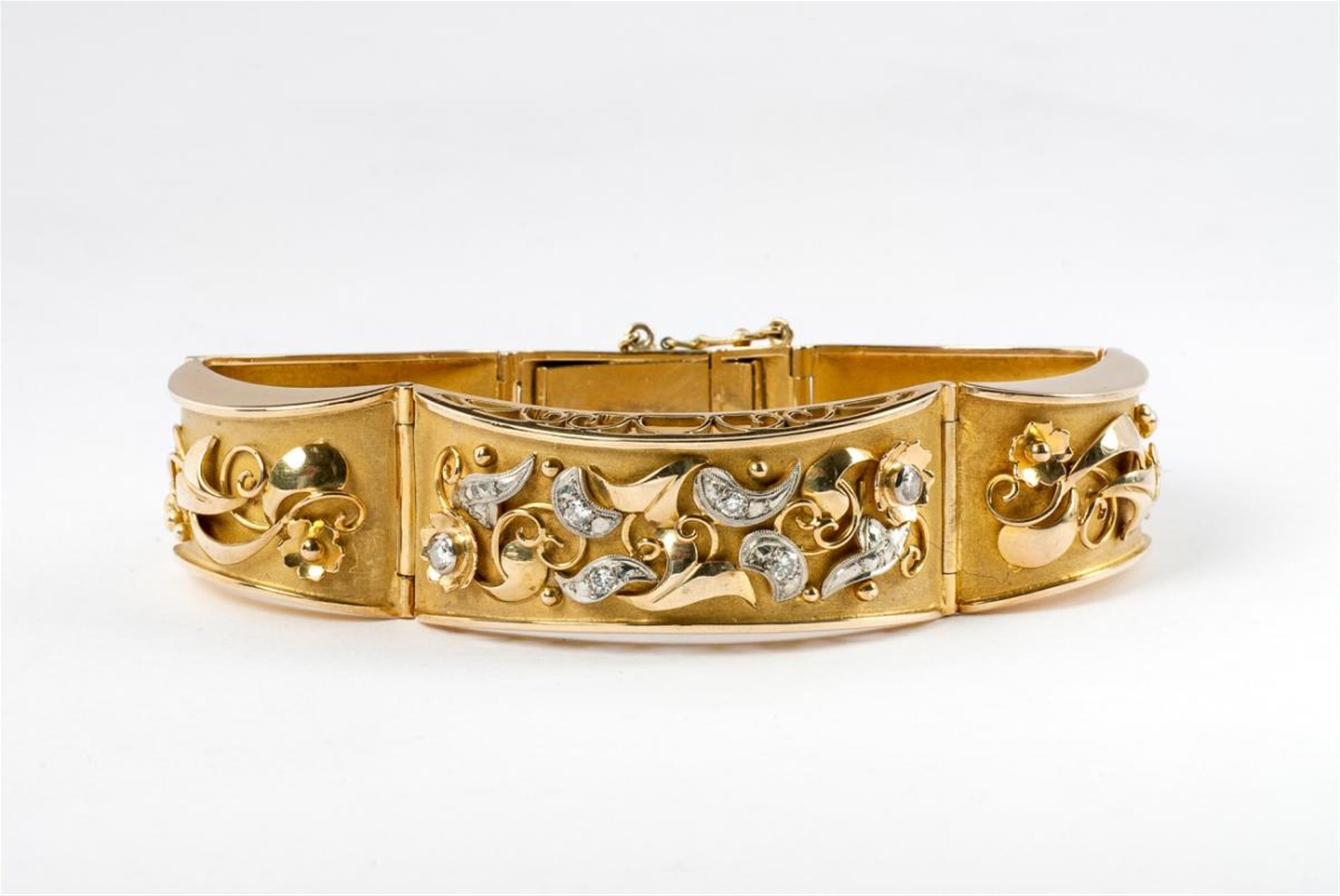 A German 14 ct gold and diamond bracelet with floral appliques. - image-1