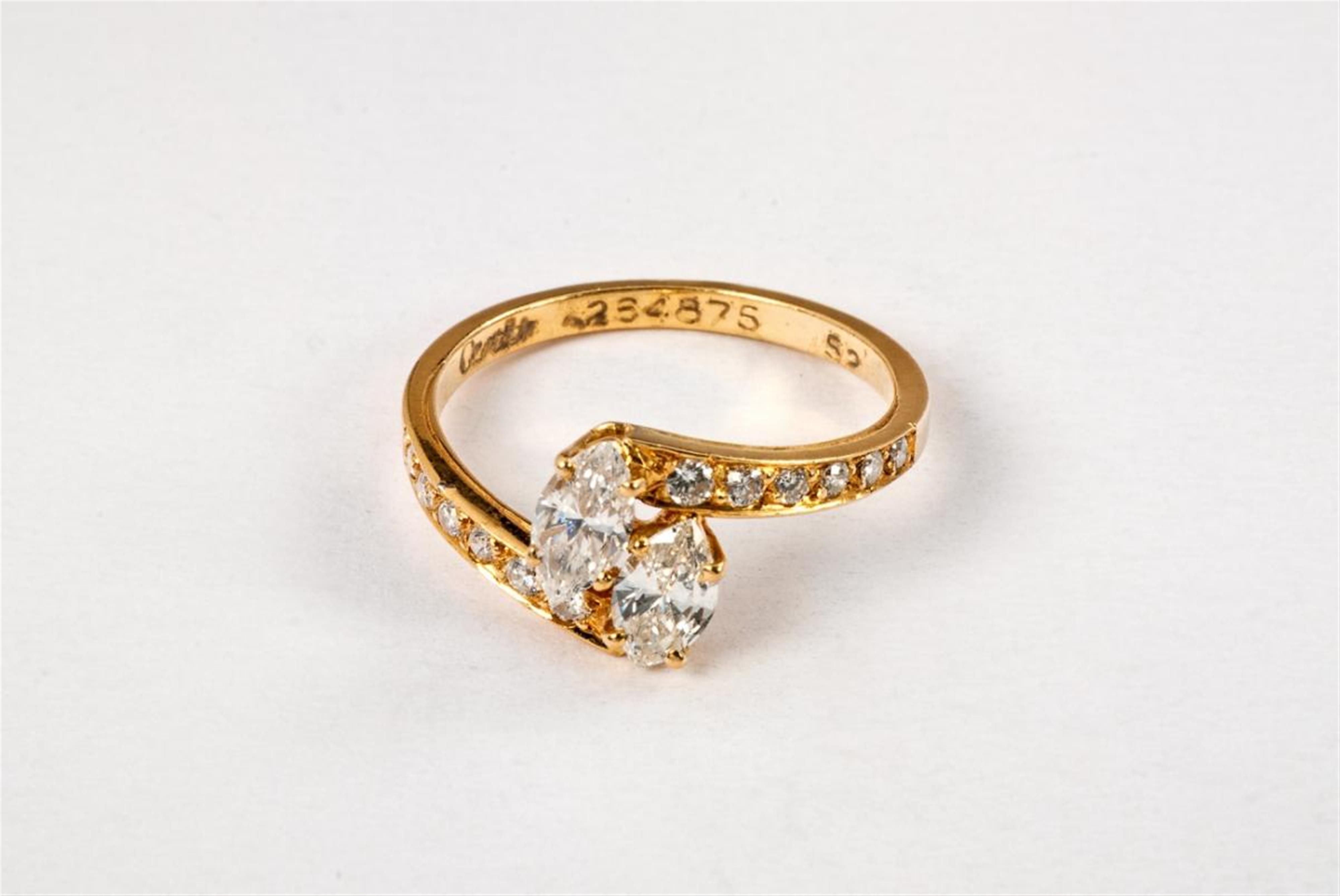 An 18 ct gold and diamond Ring by Cartier. - image-1