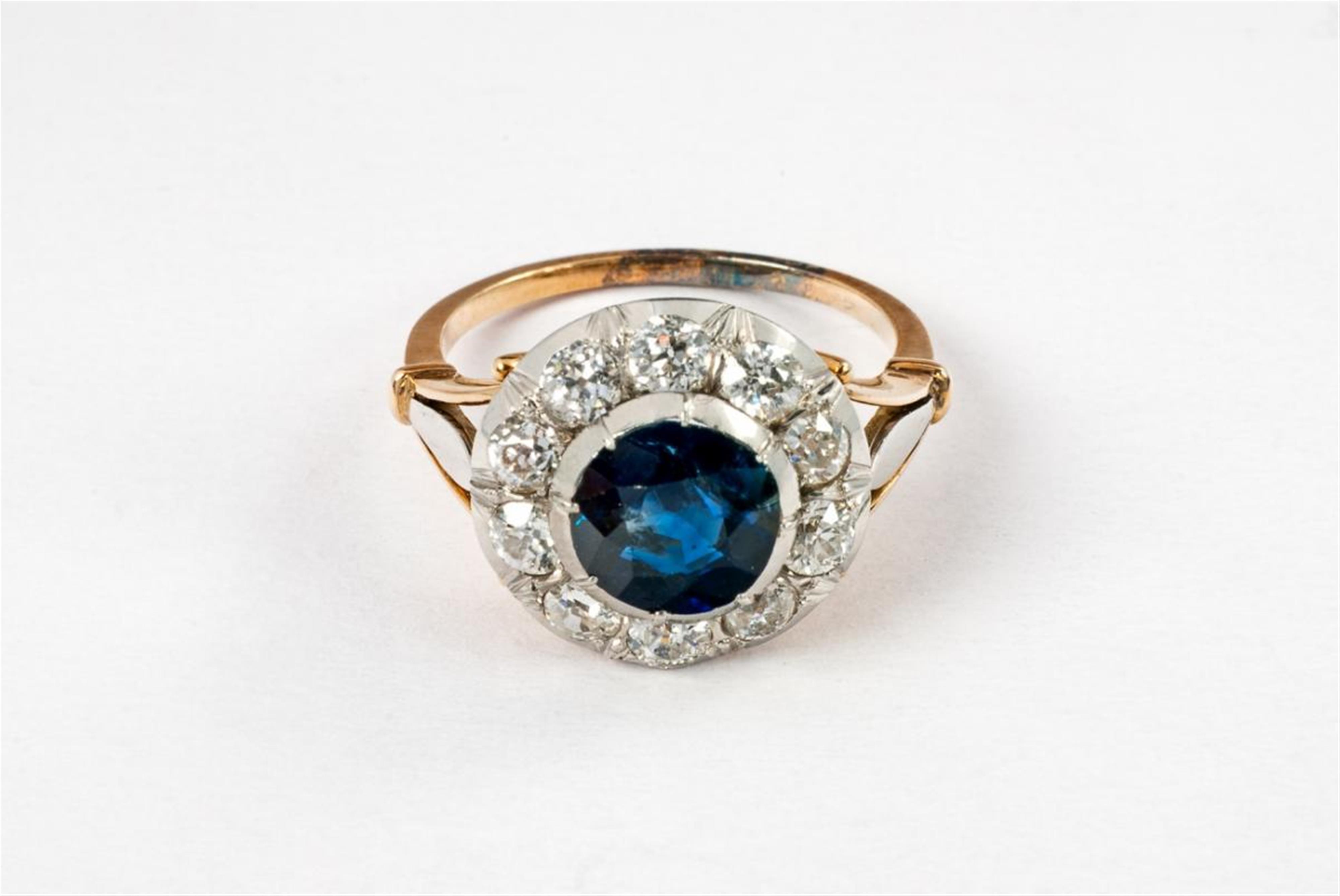 A Polish 14 ct gold, diamond and sapphire cluster ring. - image-1