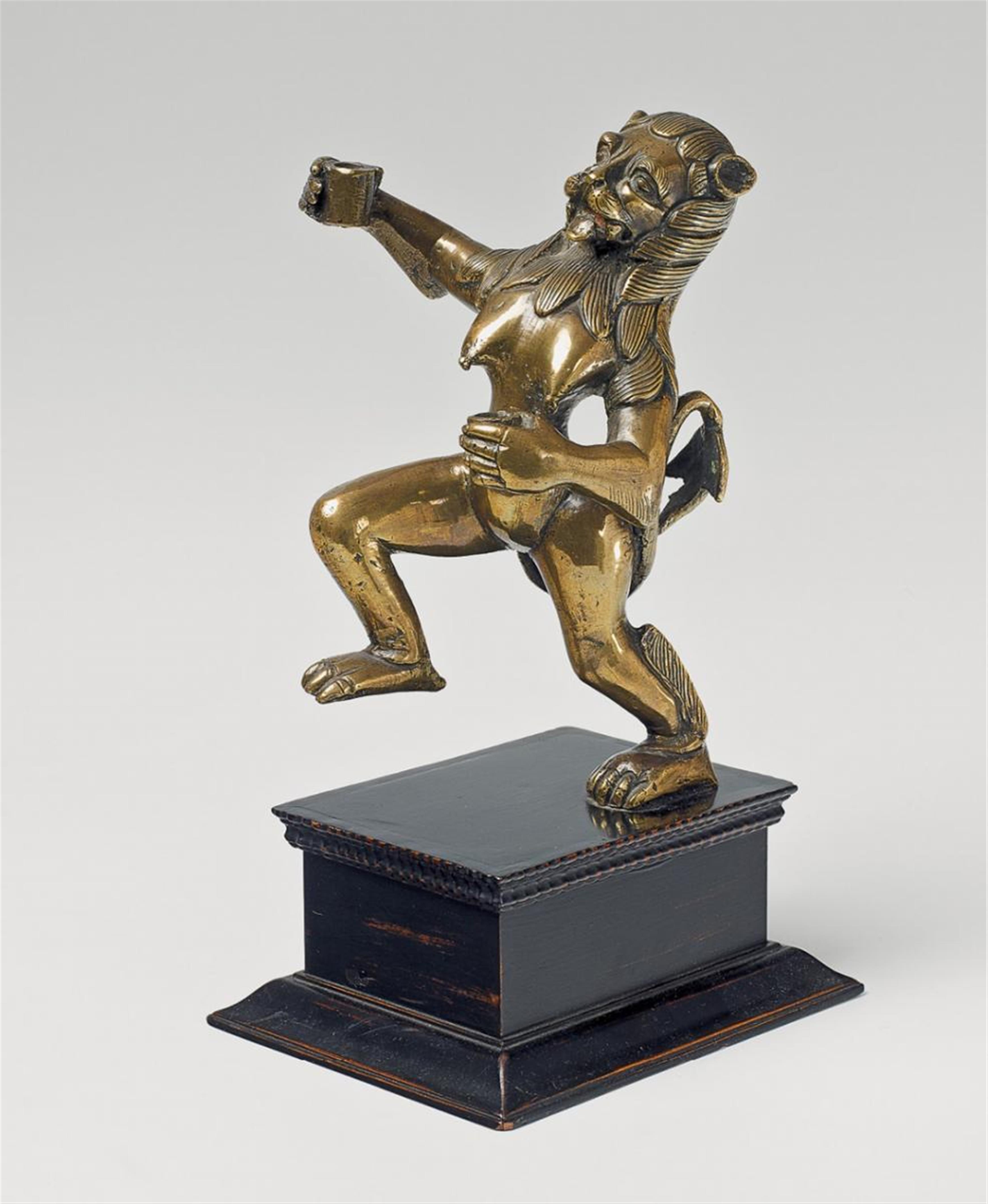 A rare Flemish bronze candlestick formed as a lioness - image-1