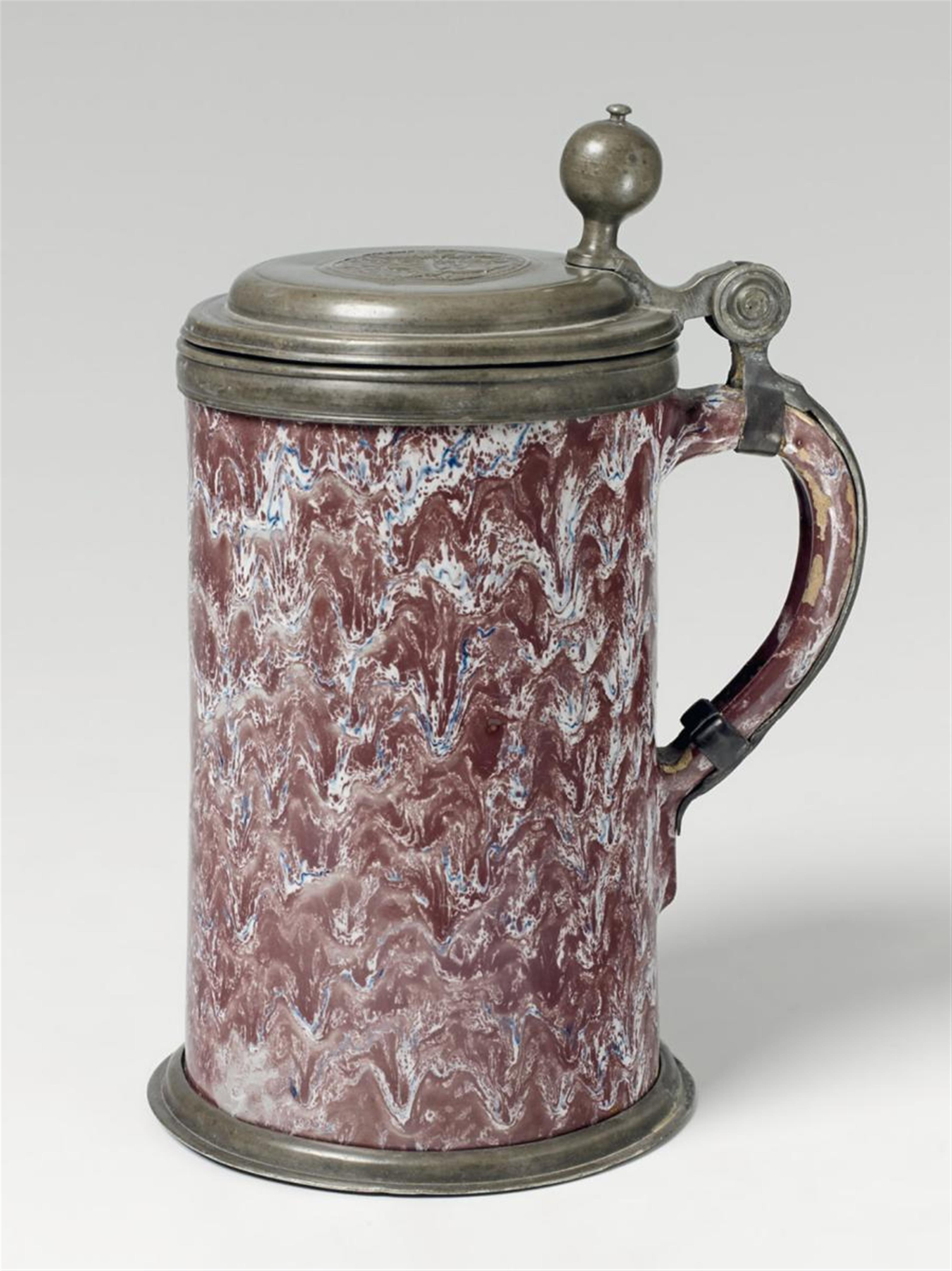 A marbled faience tankard with 'grand feu' decor - image-1