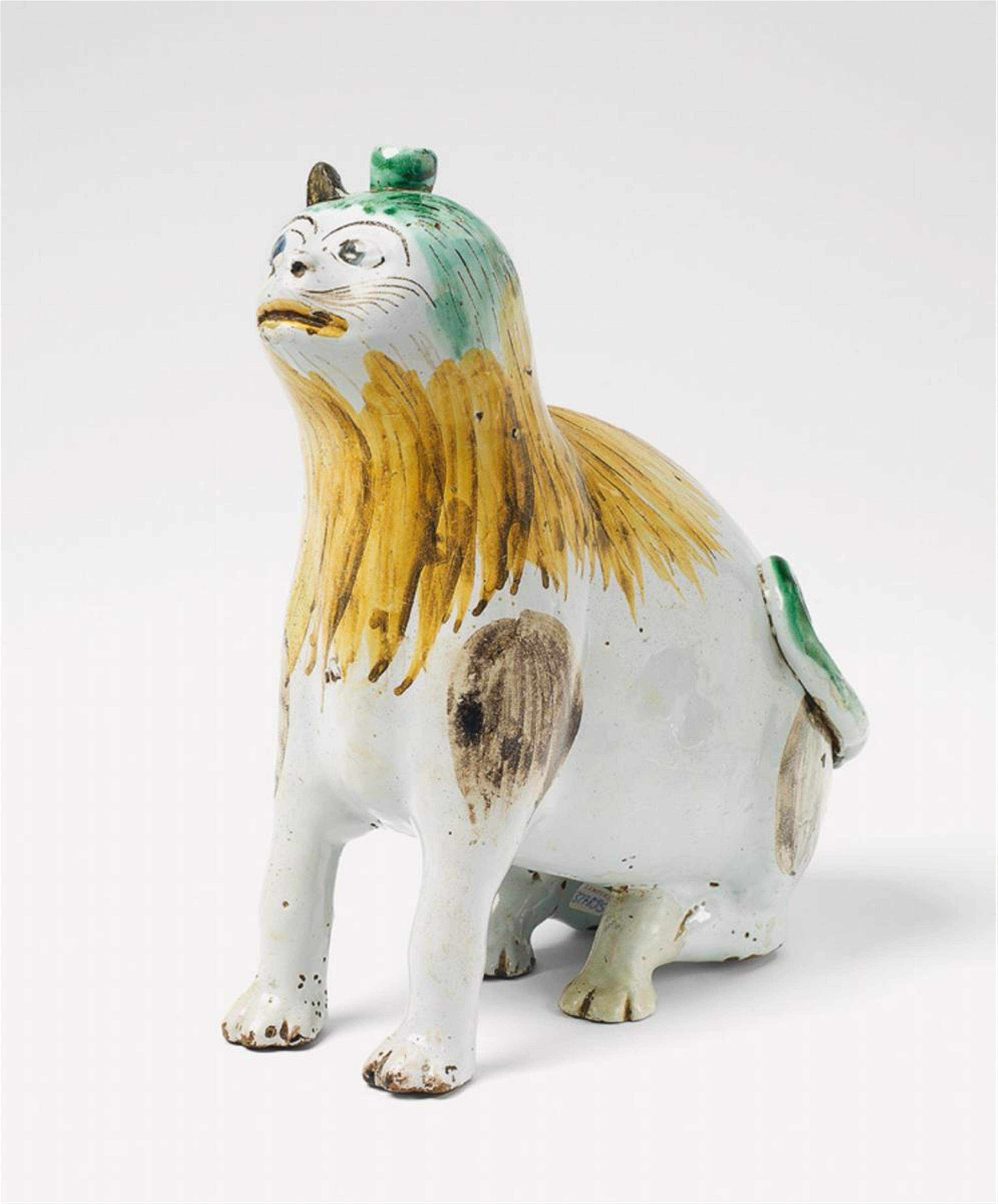 A faience trick vessel formed as a seated cat with grand feu decor. - image-1