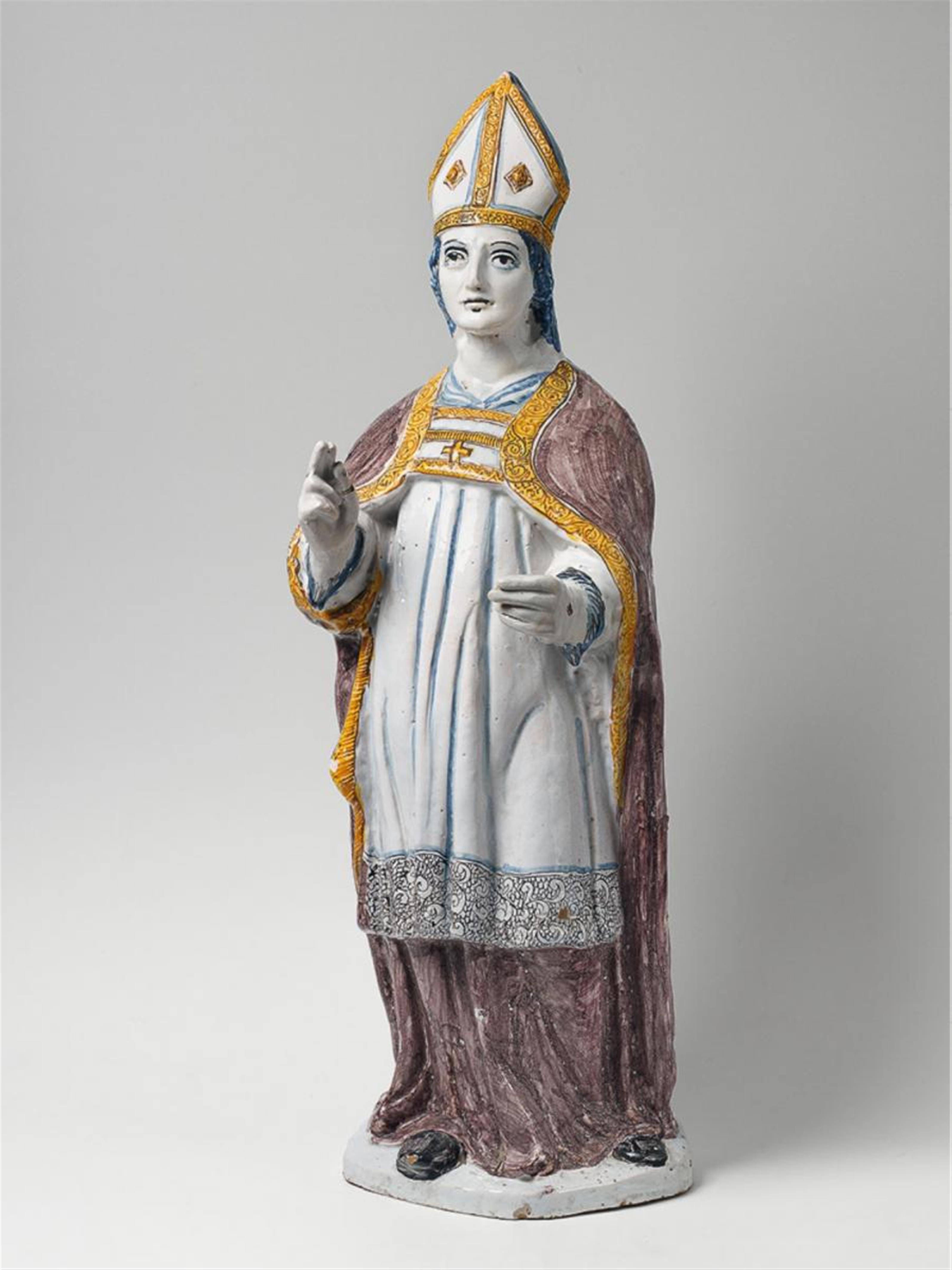 A faience figure of a standing bishop - image-1