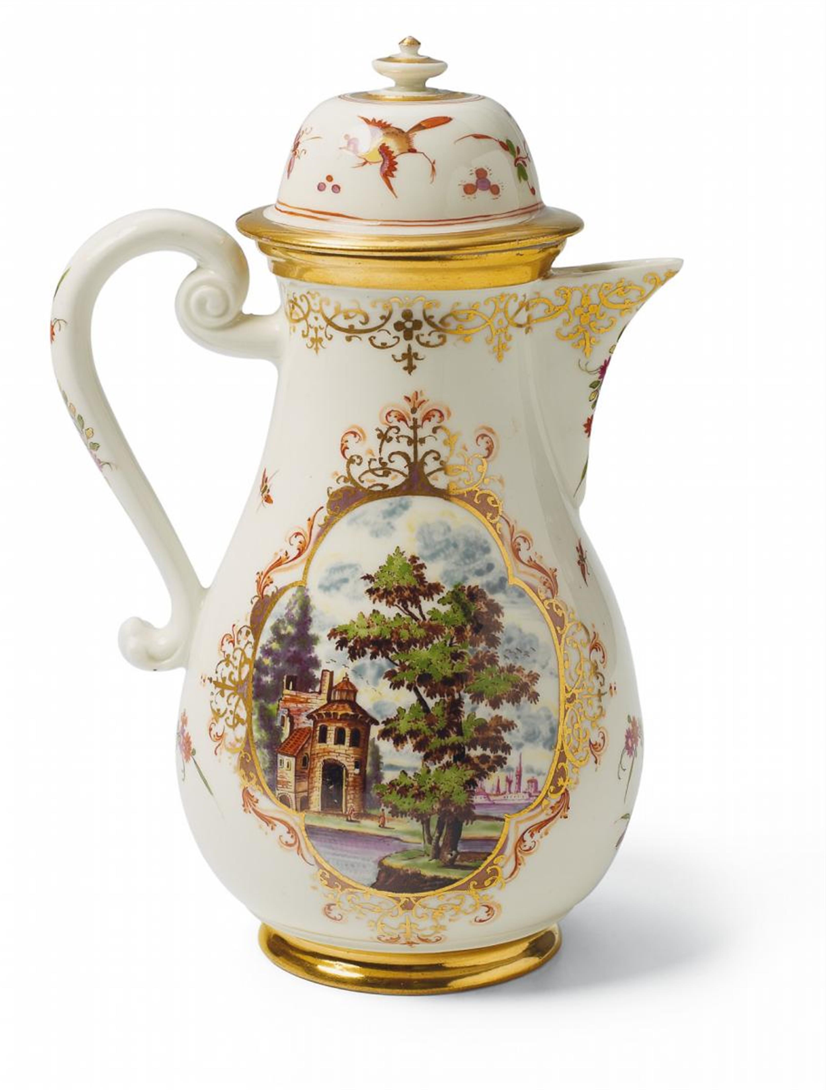 A Meissen coffee pot with delicately painted European landscapes in quatrefoil cartouches. - image-1