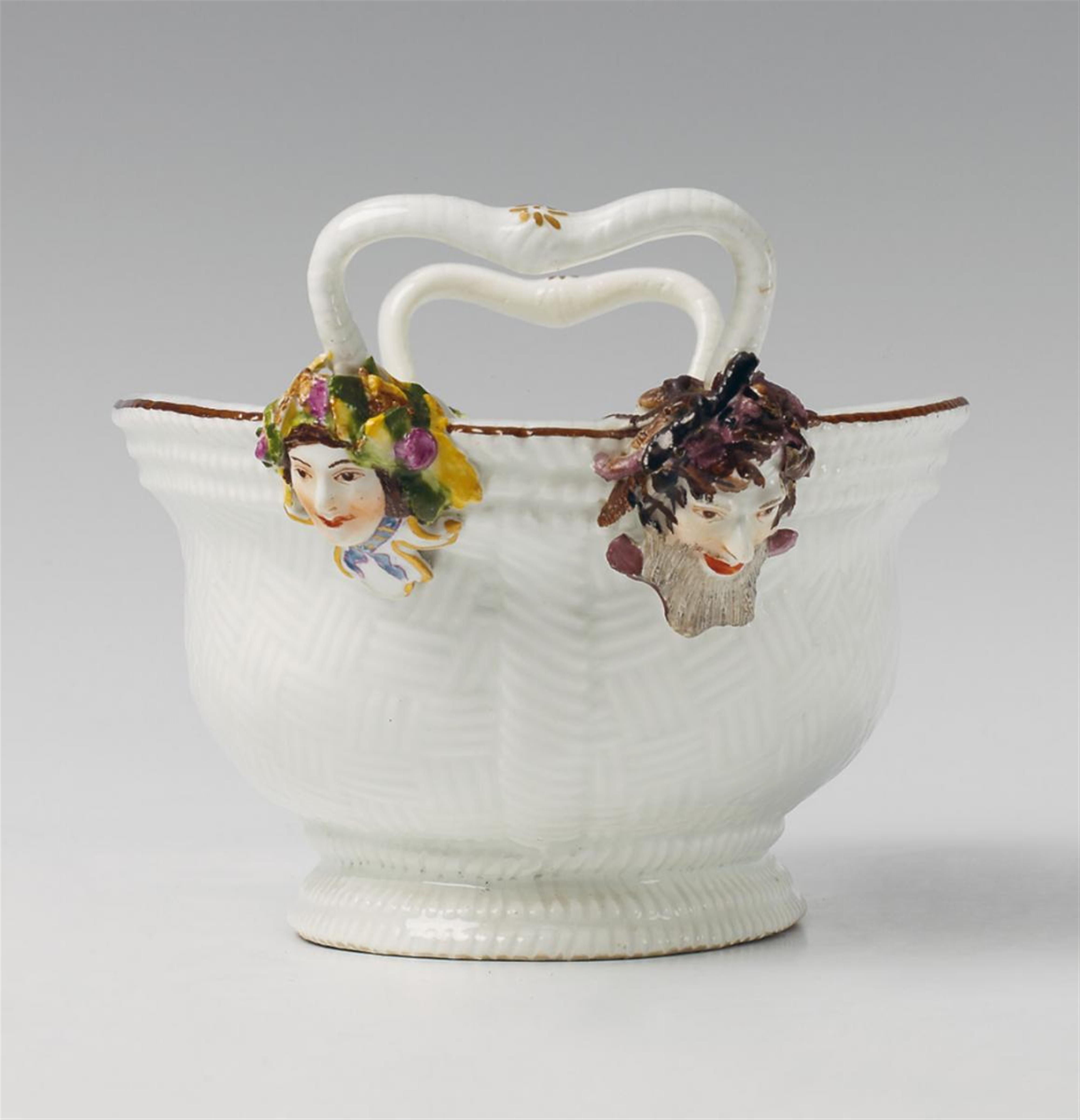 An oval Meissen basket with mascarons representing the seasons under the handles. - image-2