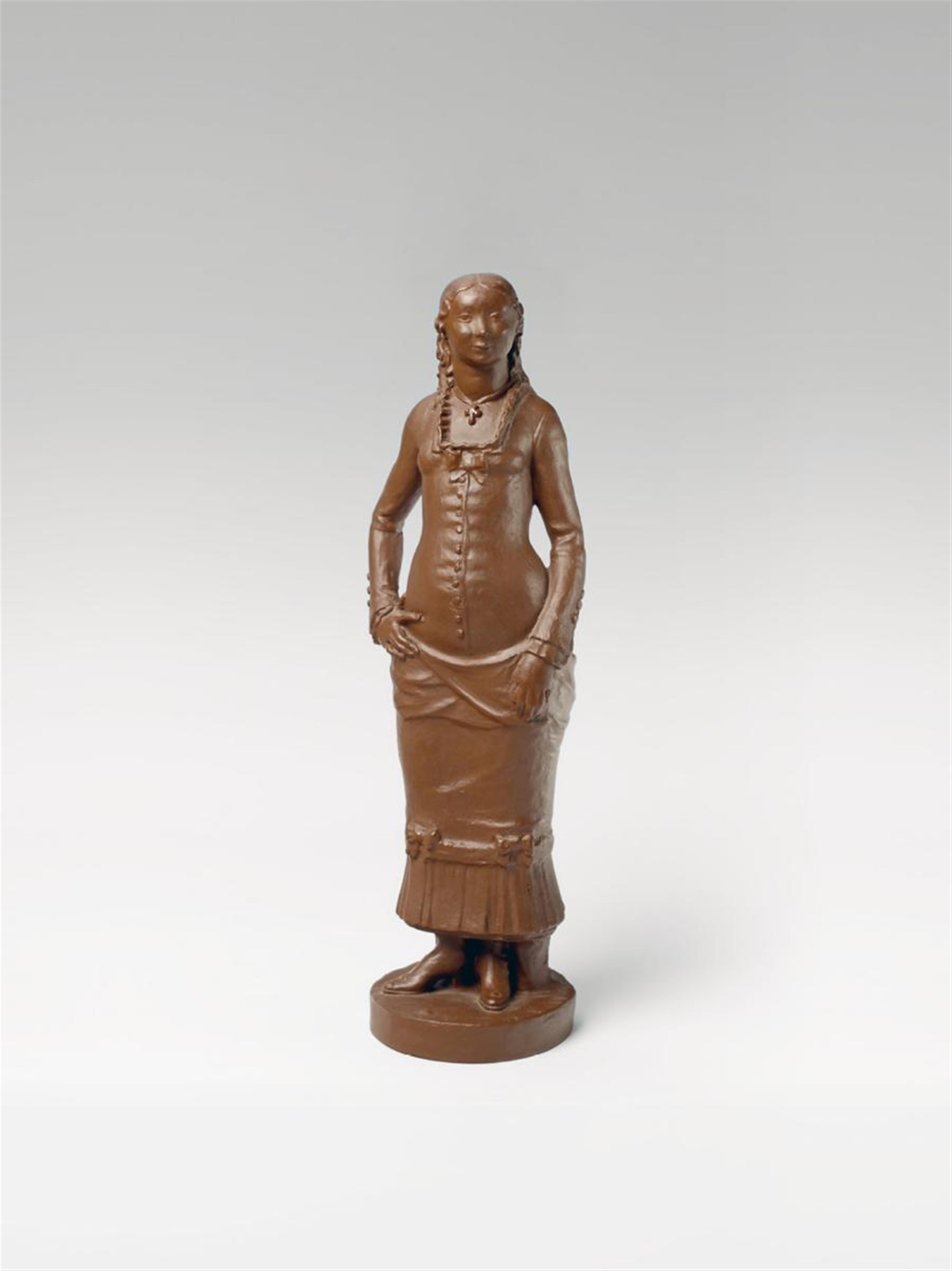 A Meissen red Boettger Steinzeug figure of a standing girl. - image-2