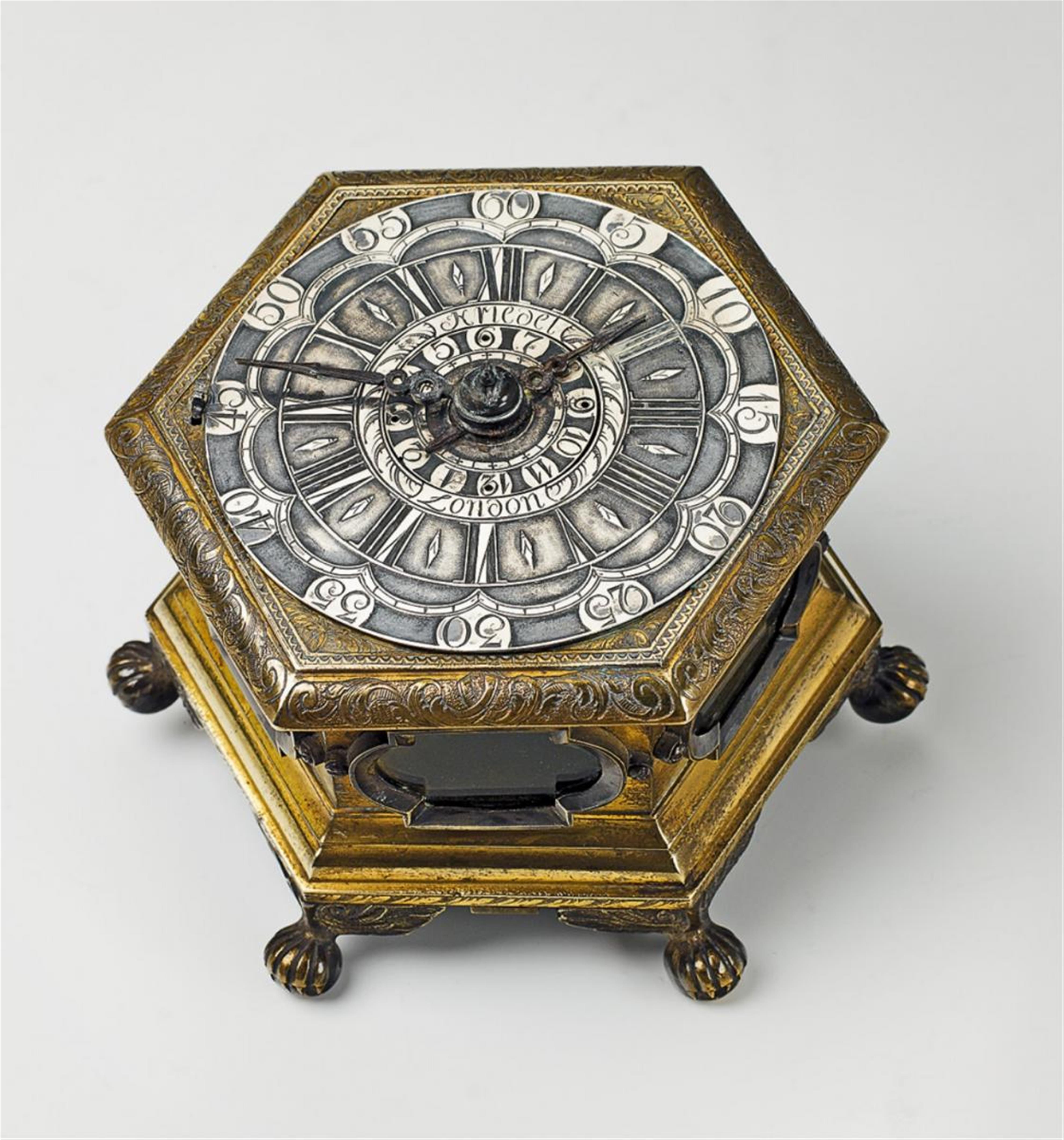 A hexagonal gilt bronze table clock - image-1