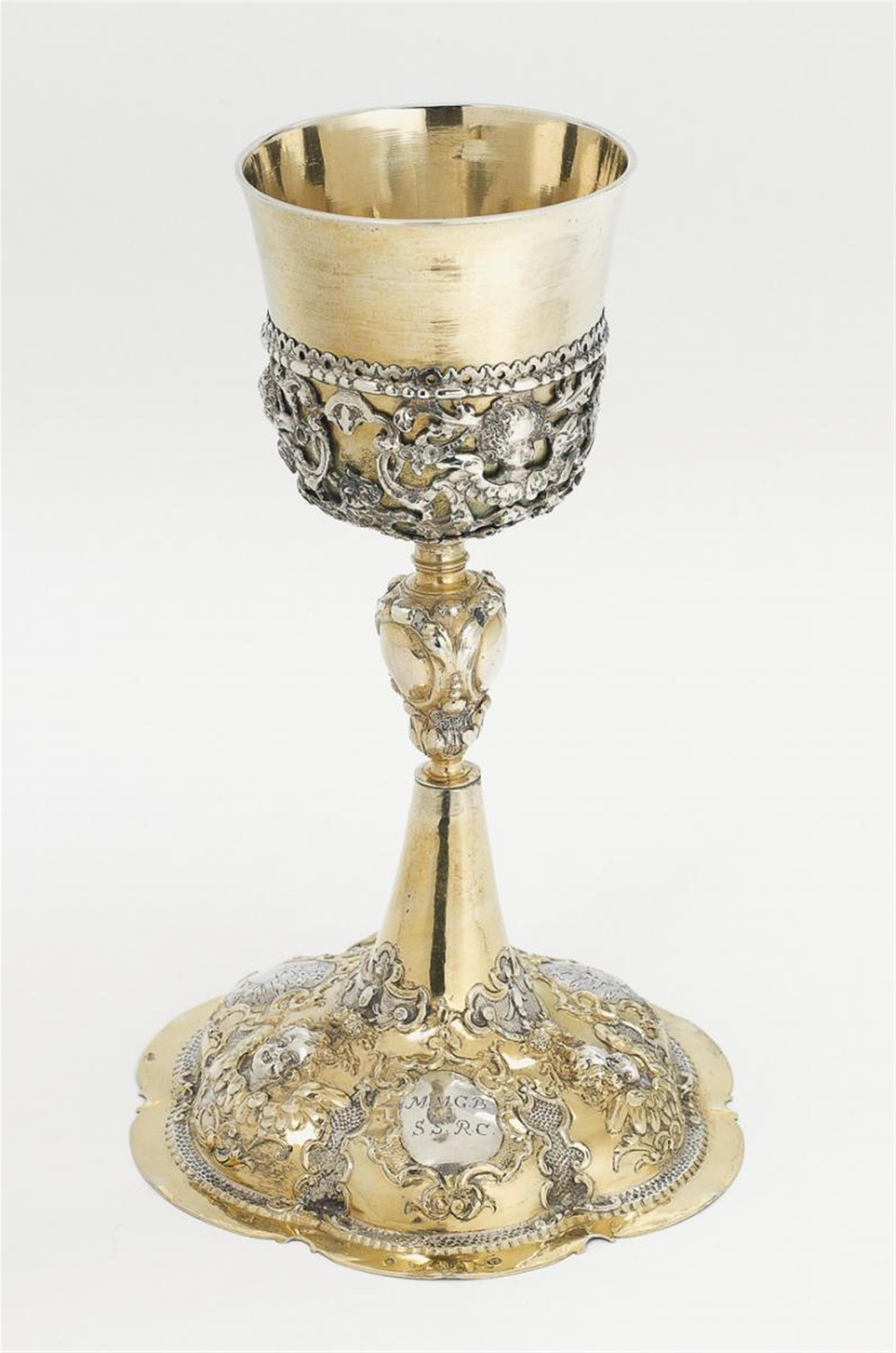 An Augsburg silver partially gilt communion chalice, monogrammed "M.M.G.B. S.S.R.C.". Marks of Johann Zeckel, 1709 - 12. Included a Viennese silver paten, 19th C. - image-1