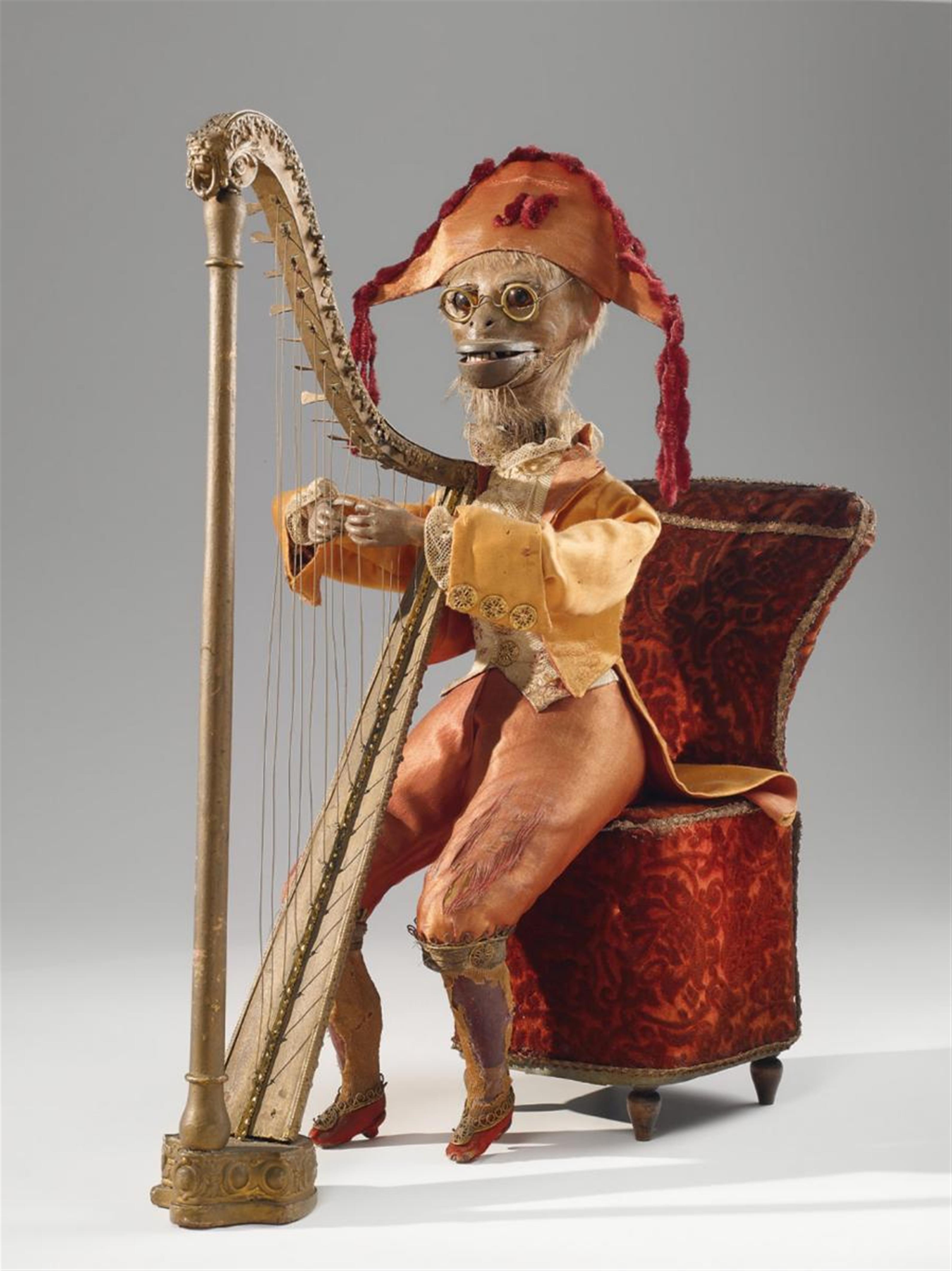A musical automaton formed as a monkey playing a harp - image-1