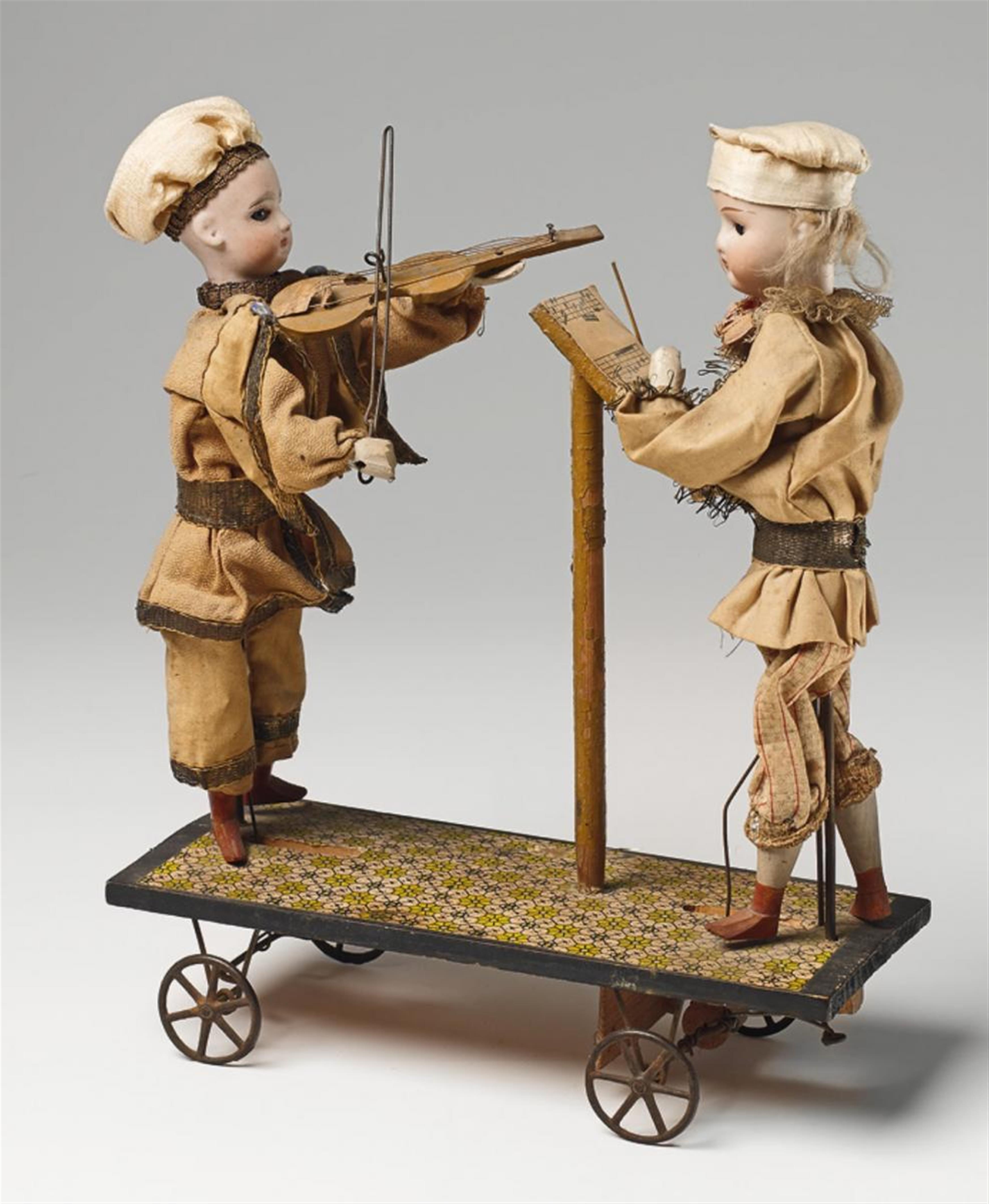 An pull-along automaton with two little musicians - image-1