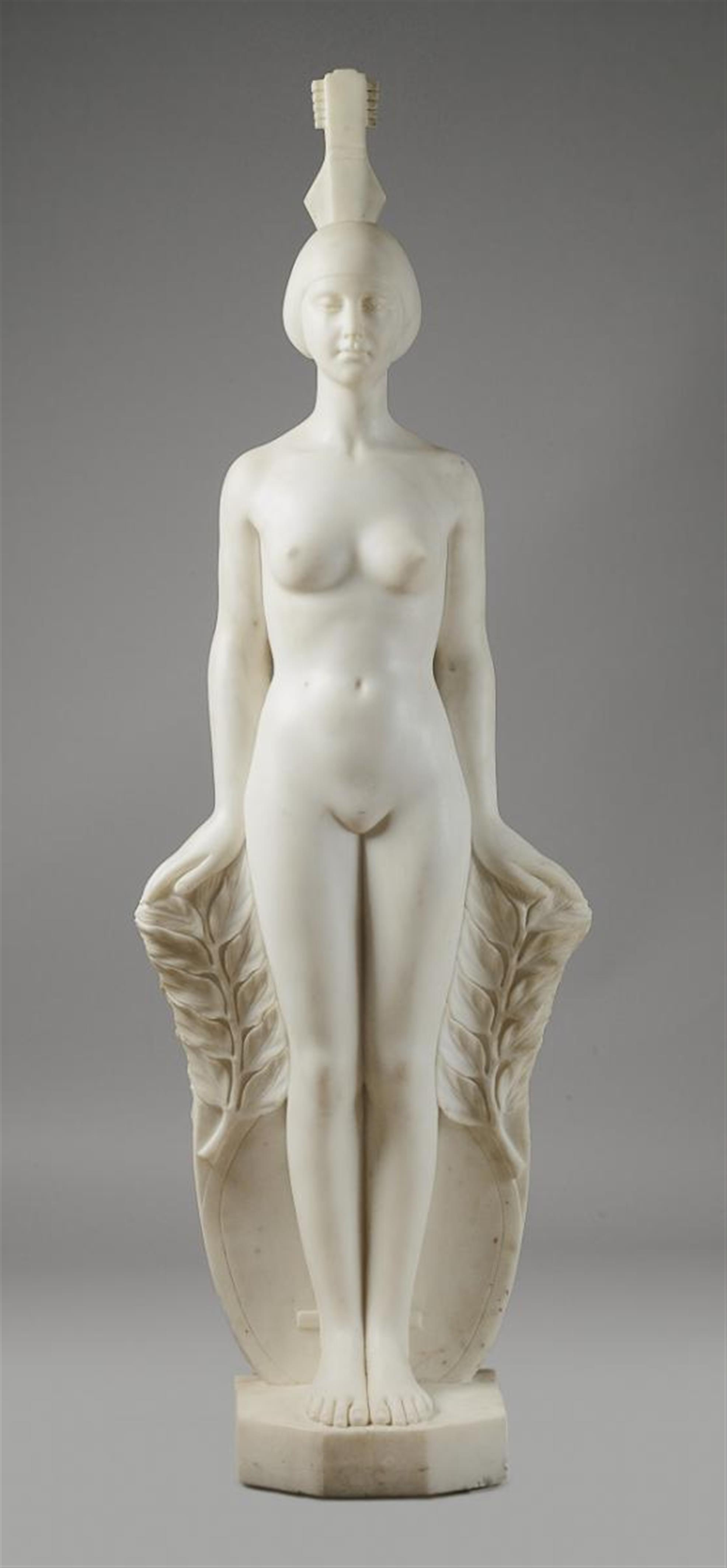 A Hungarian white marble Art Déco figure of a standing woman - image-1