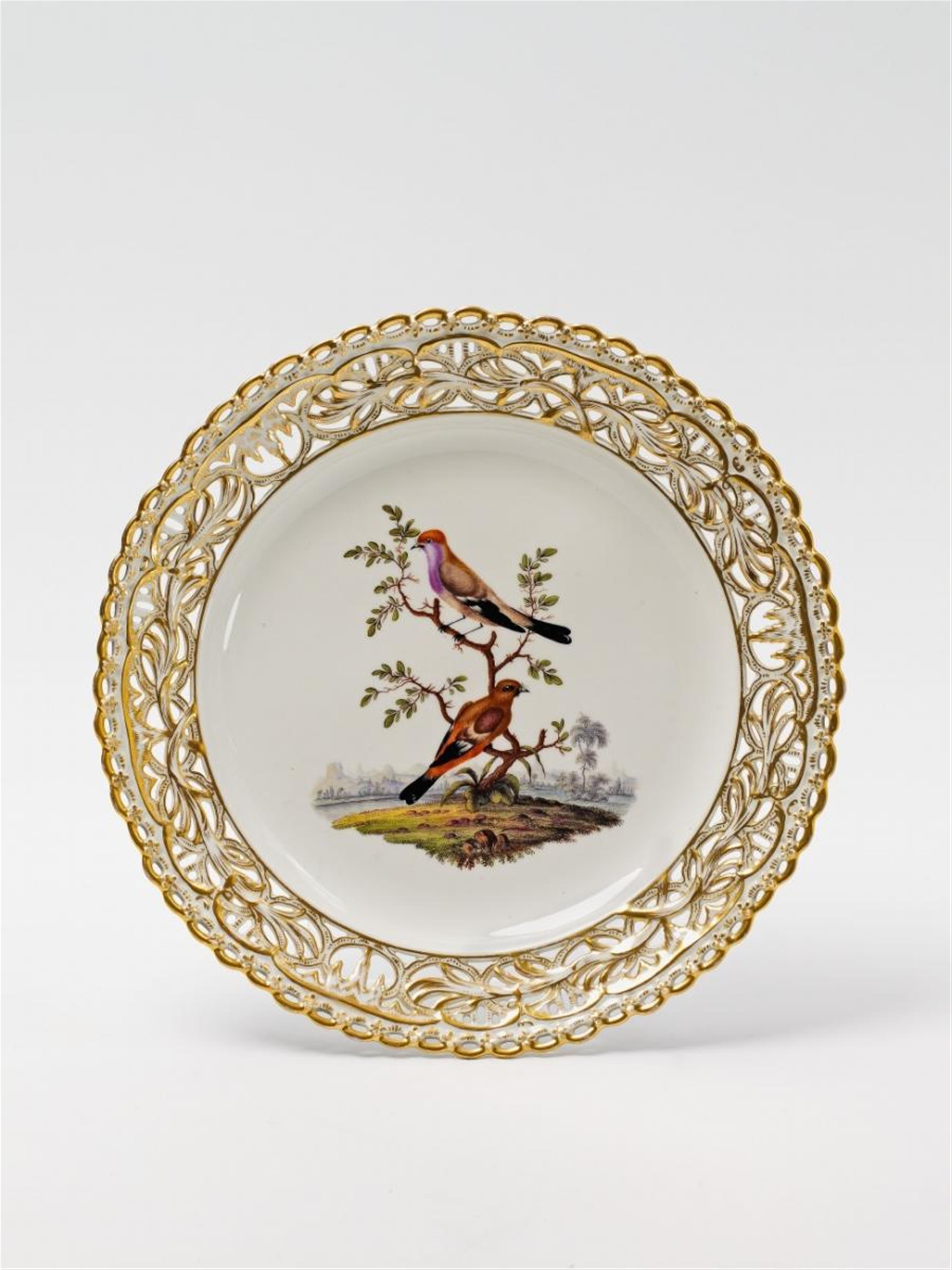 A KPM dessert plate with bird decor. - image-1