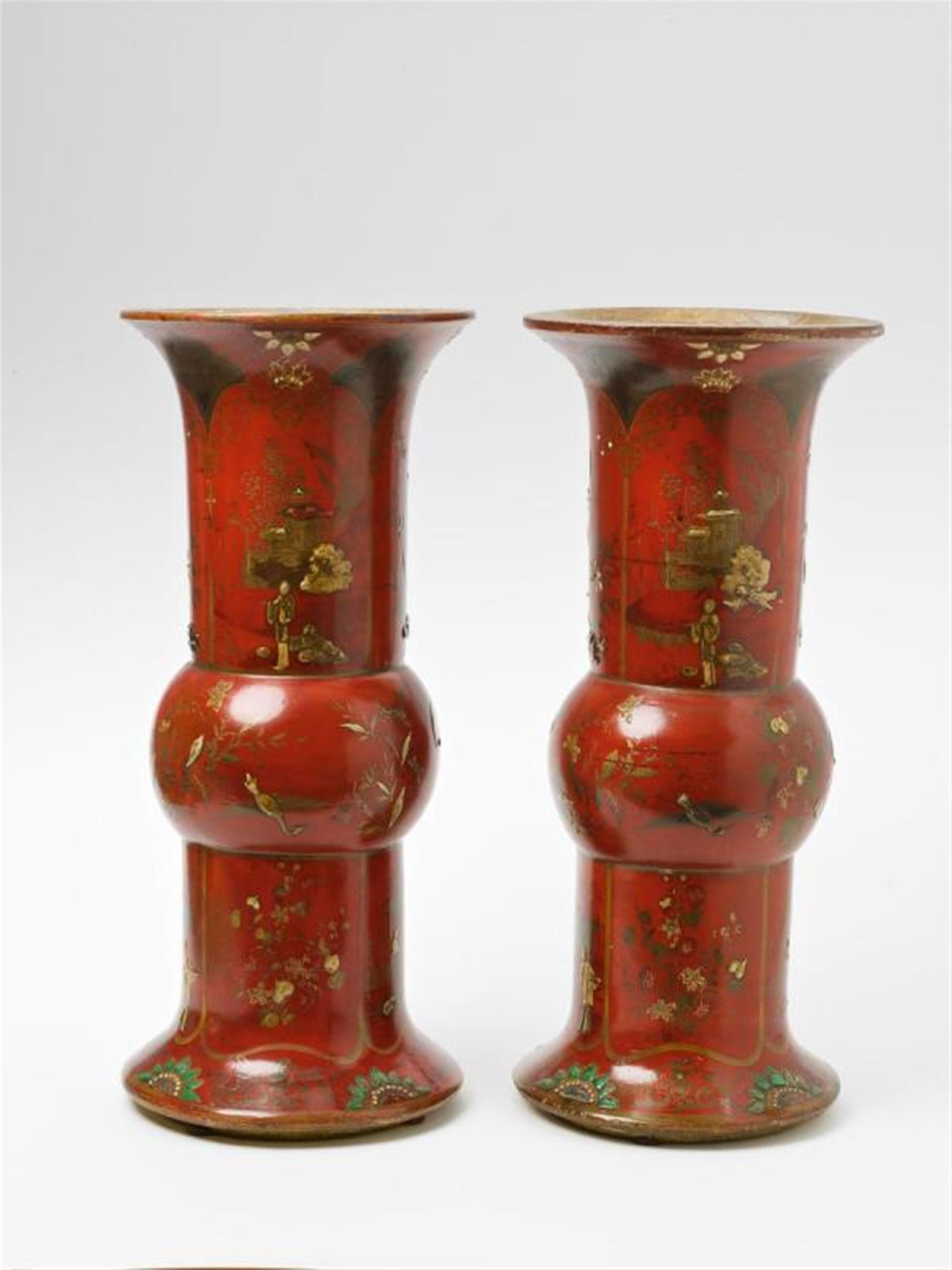 A rare pair of Berlin red lacquer painted faience vases. - image-1