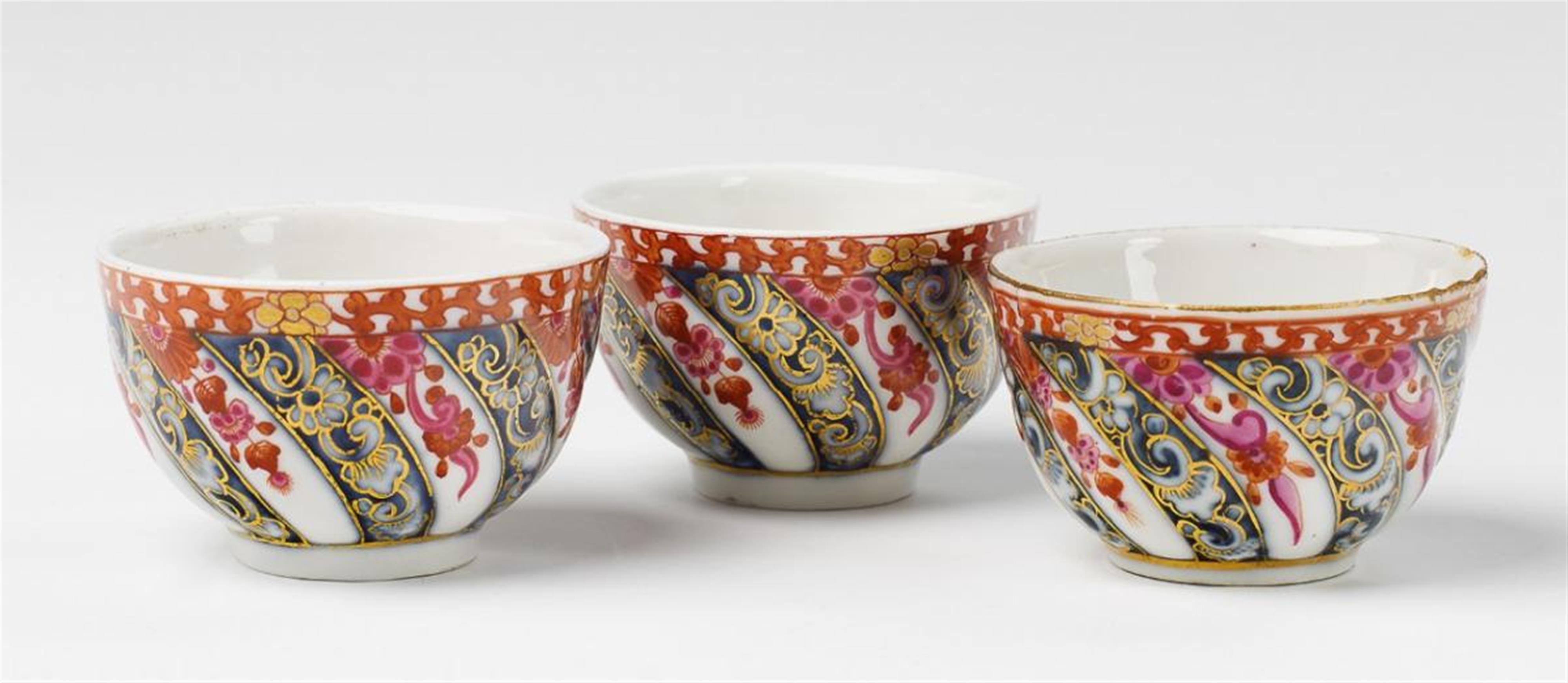 Three Meissen and KPM porcelain tea cups. - image-1