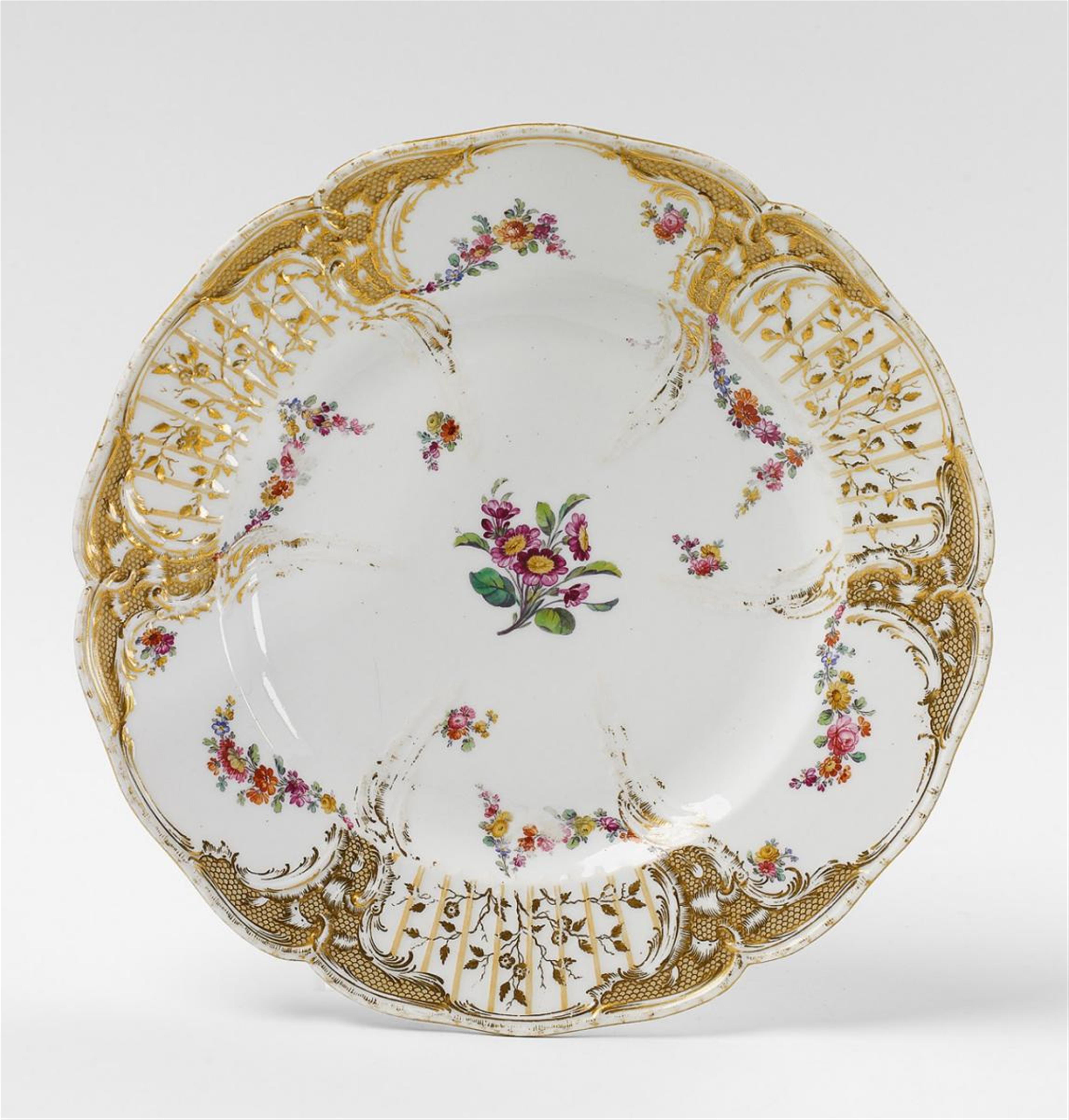 A KPM porcelain dinner plate from the 1st Potsdam service. - image-1