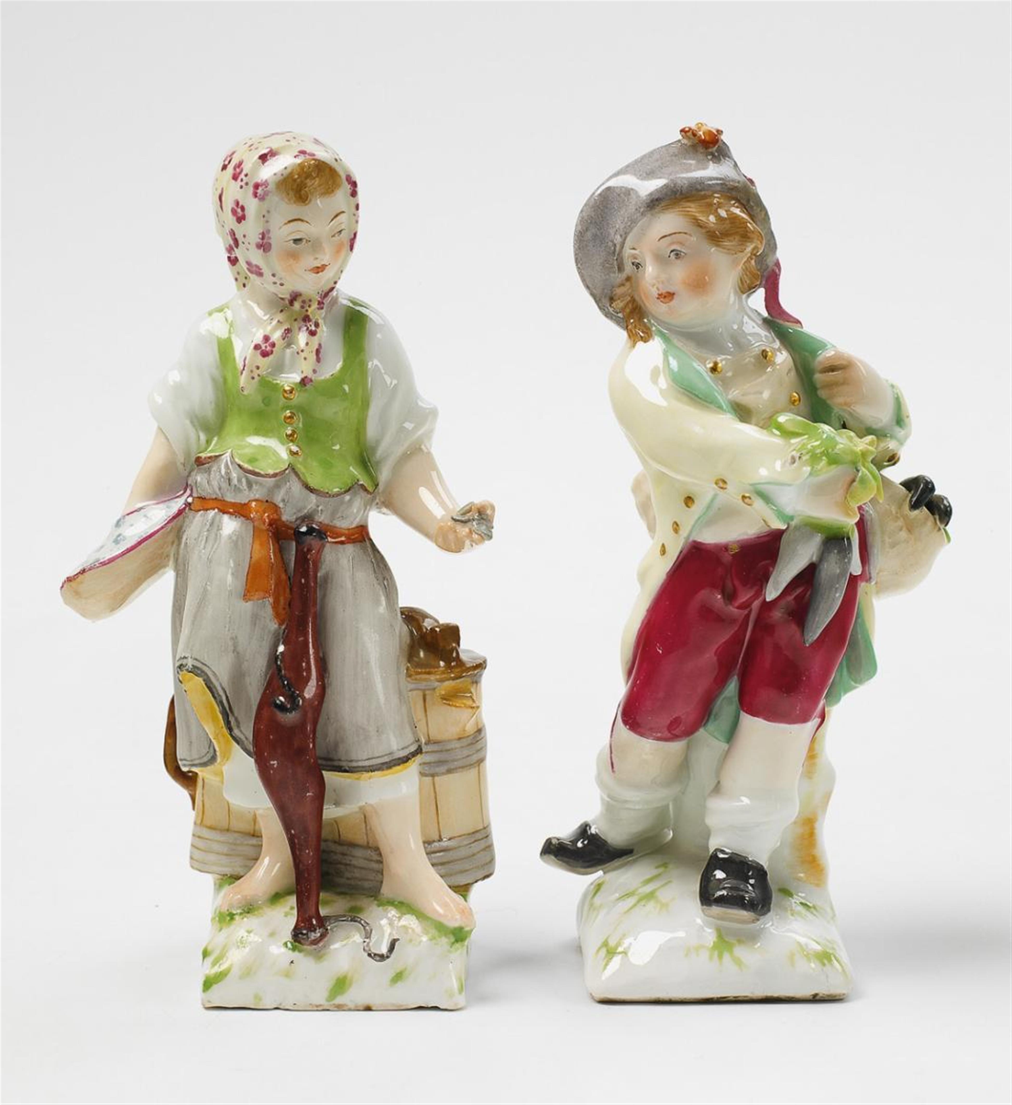 Two KPM porcelain figures of children as merchants. - image-1