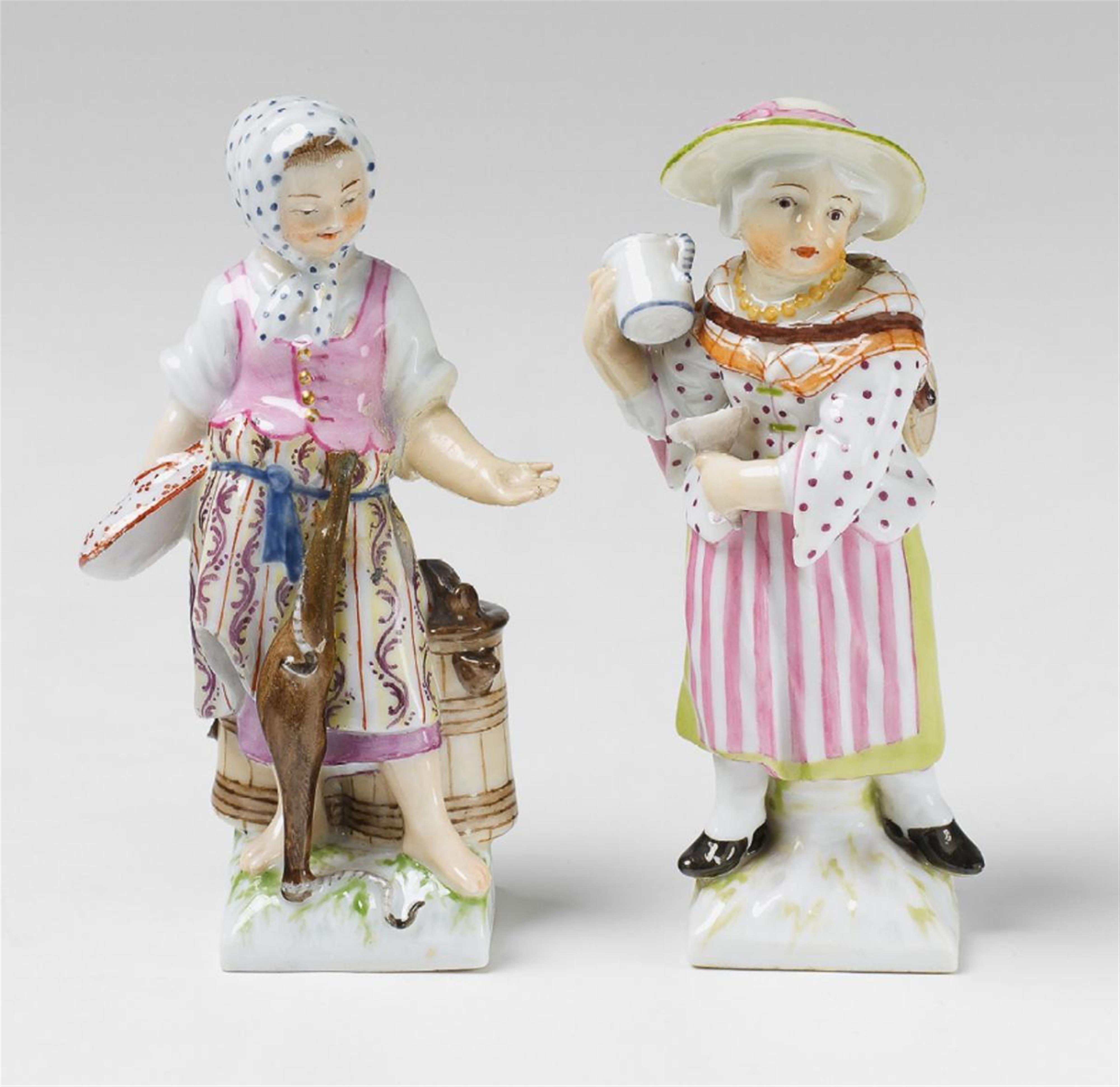 Two KPM porcelain figures of little merchants. - image-1