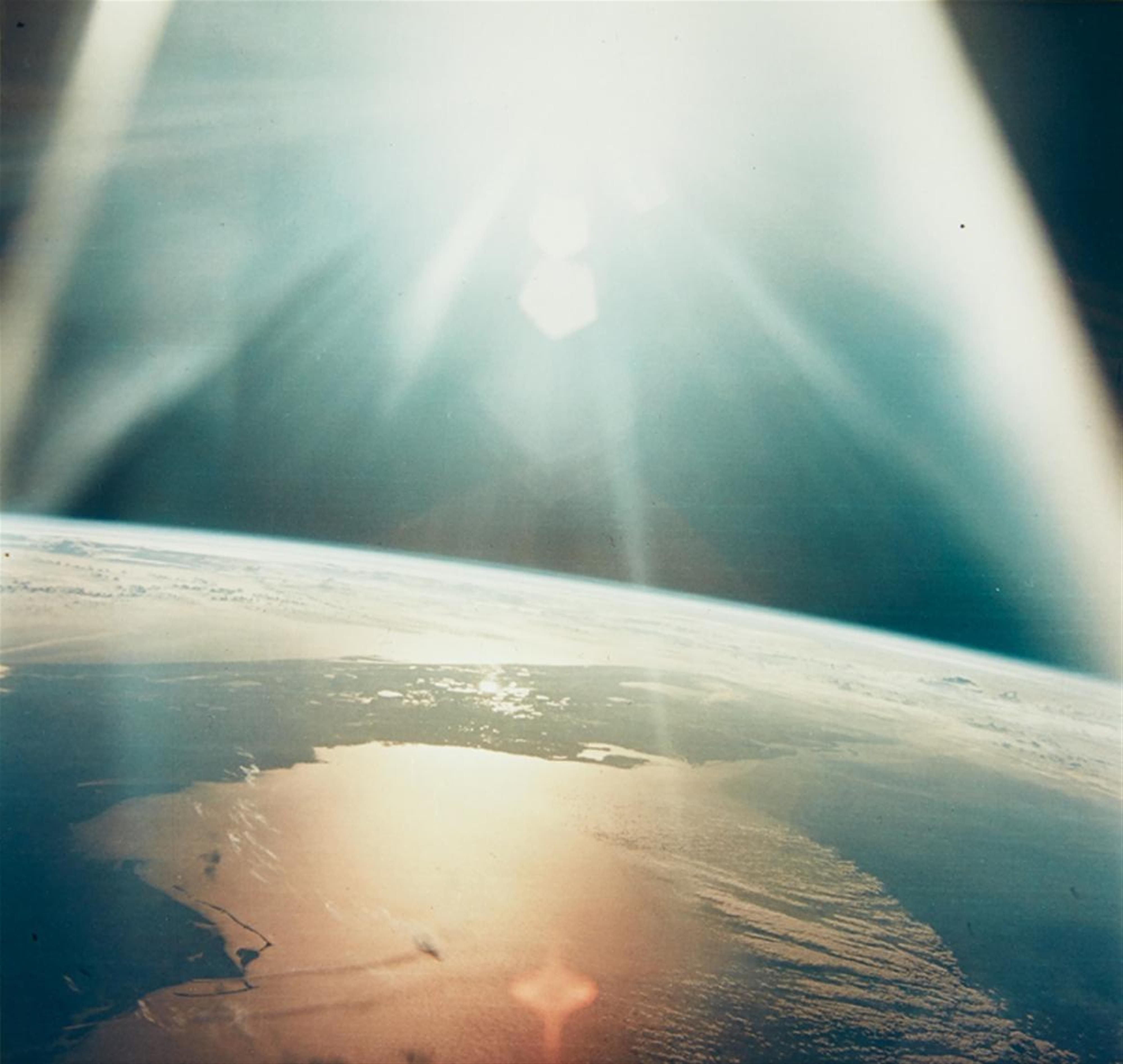 NASA - The morning sun reflects on the Gulf of Mexico and the Atlantic Ocean, Apollo 7 - image-1