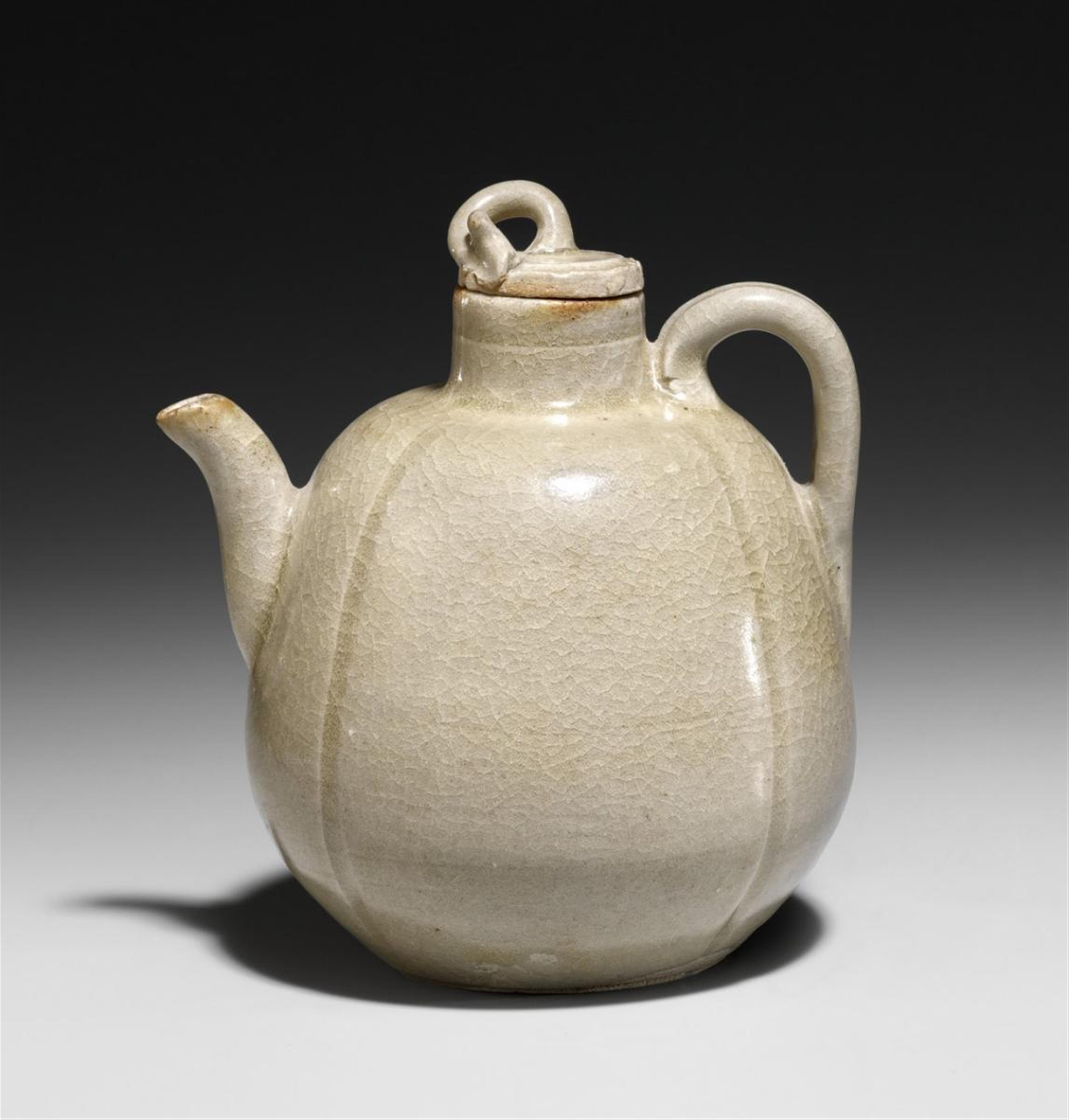 A greyish-green stoneware melon-shaped ewer and cover. Probably Yueyao. Five Dynasties period/Song dynasty, 10th-12th century - image-1