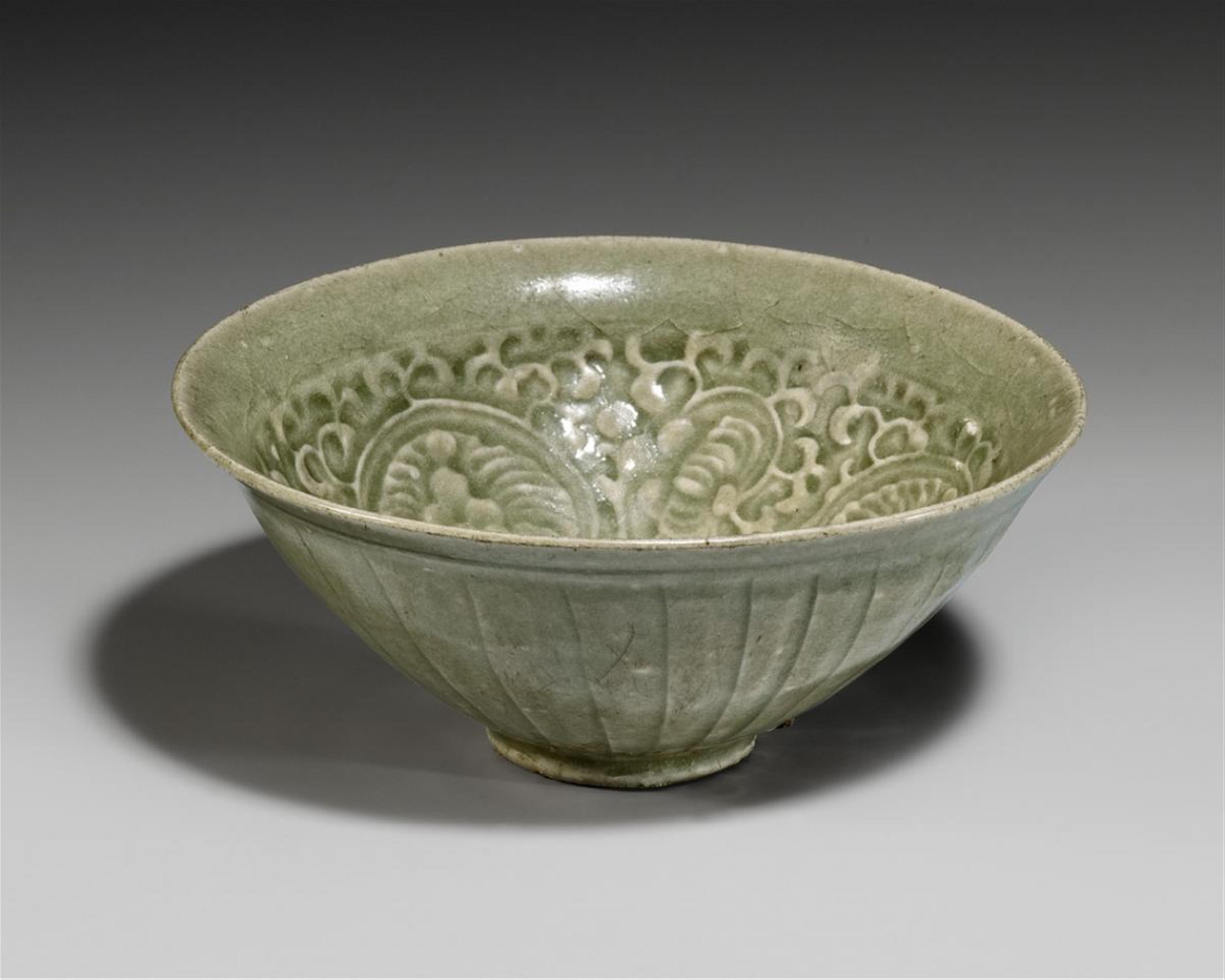 A carved Yaozhou celadon bowl. Northern Song dynasty (960-1279) - image-1