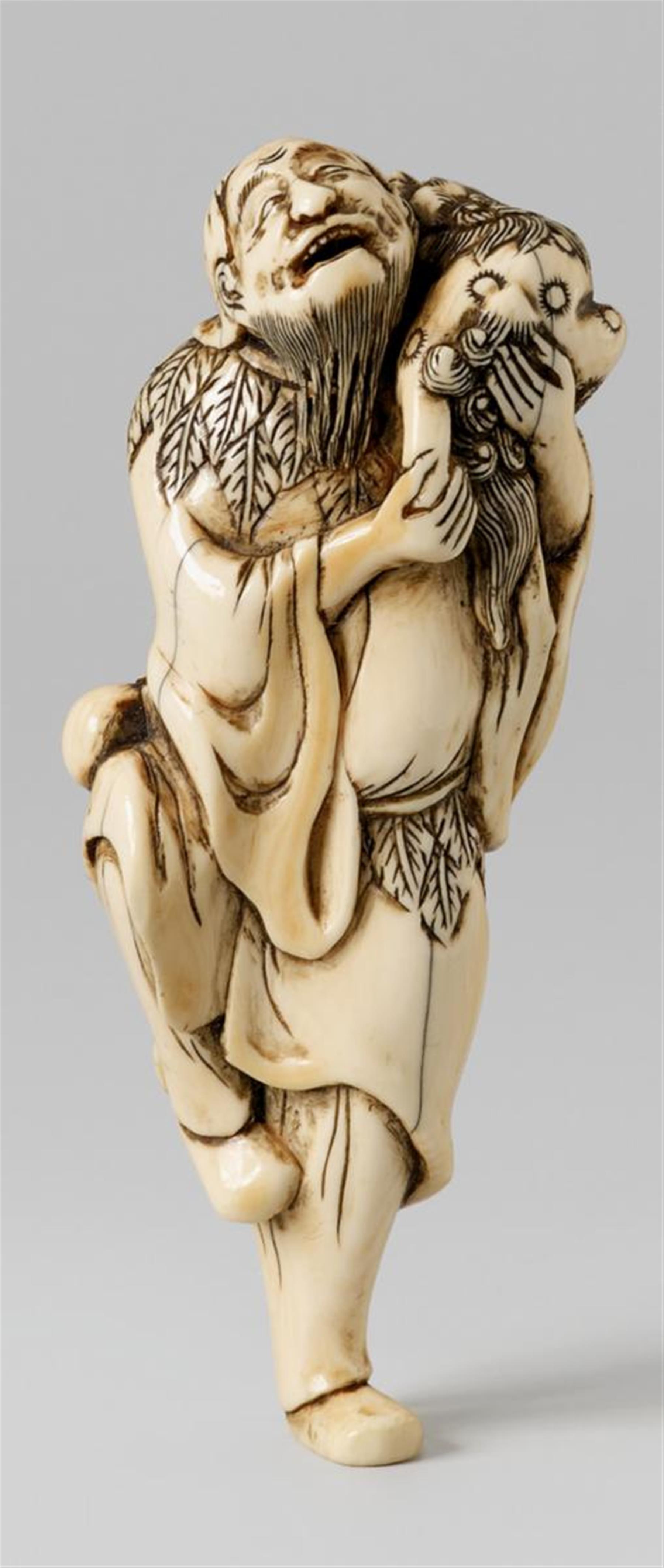 A large ivory netsuke of a tall sennin with a shishi. Late 18th century - image-1