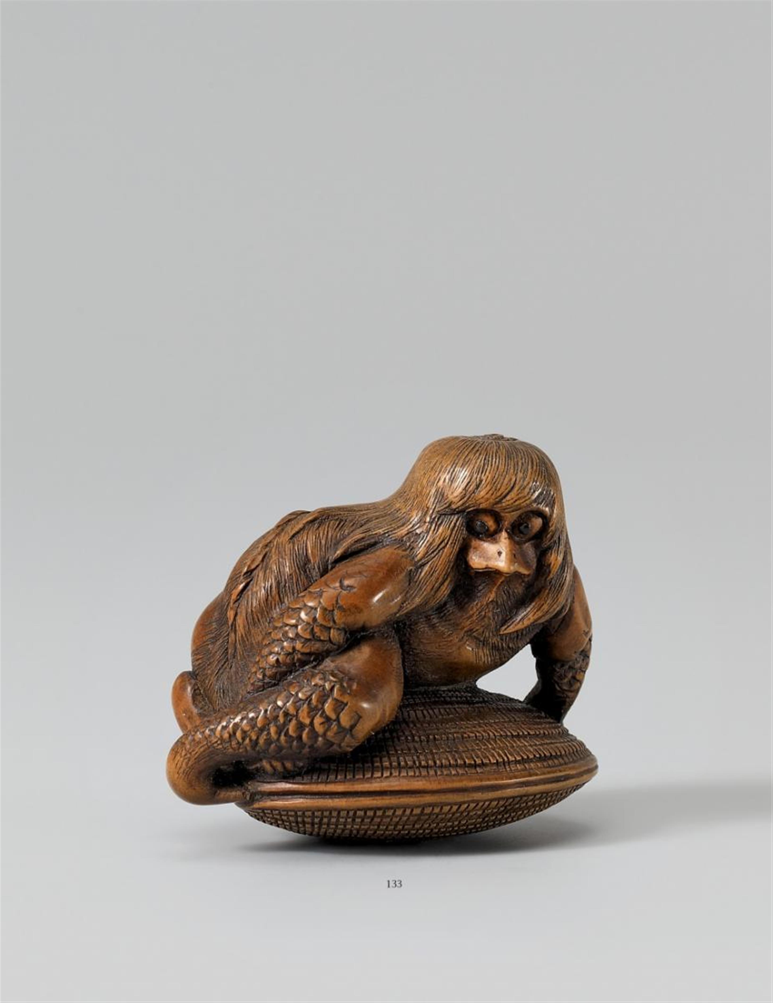 A fine and very large boxwood netsuke of a kappa on a clam by Hideharu. Second half 19th century - image-1