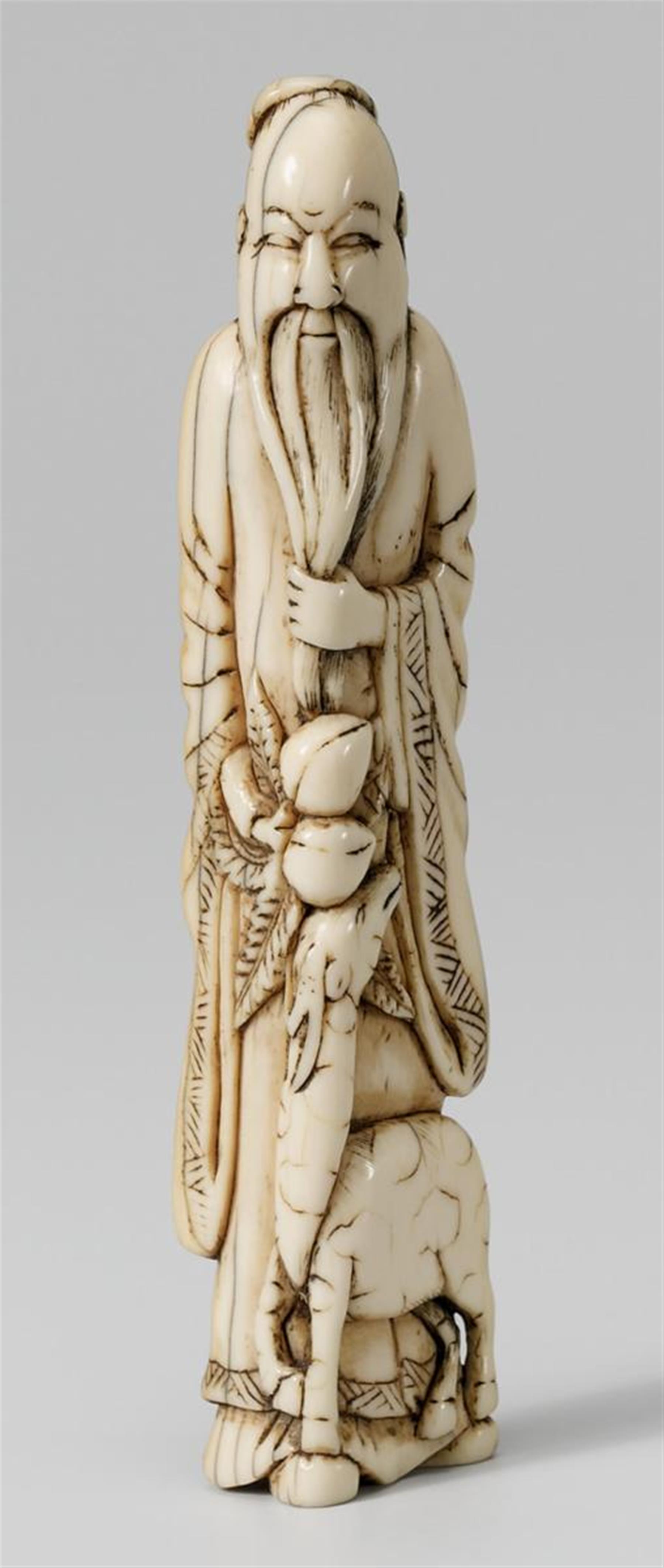 An ivory netsuke of Tôbôsaku Sennin. Late 18th century - image-1