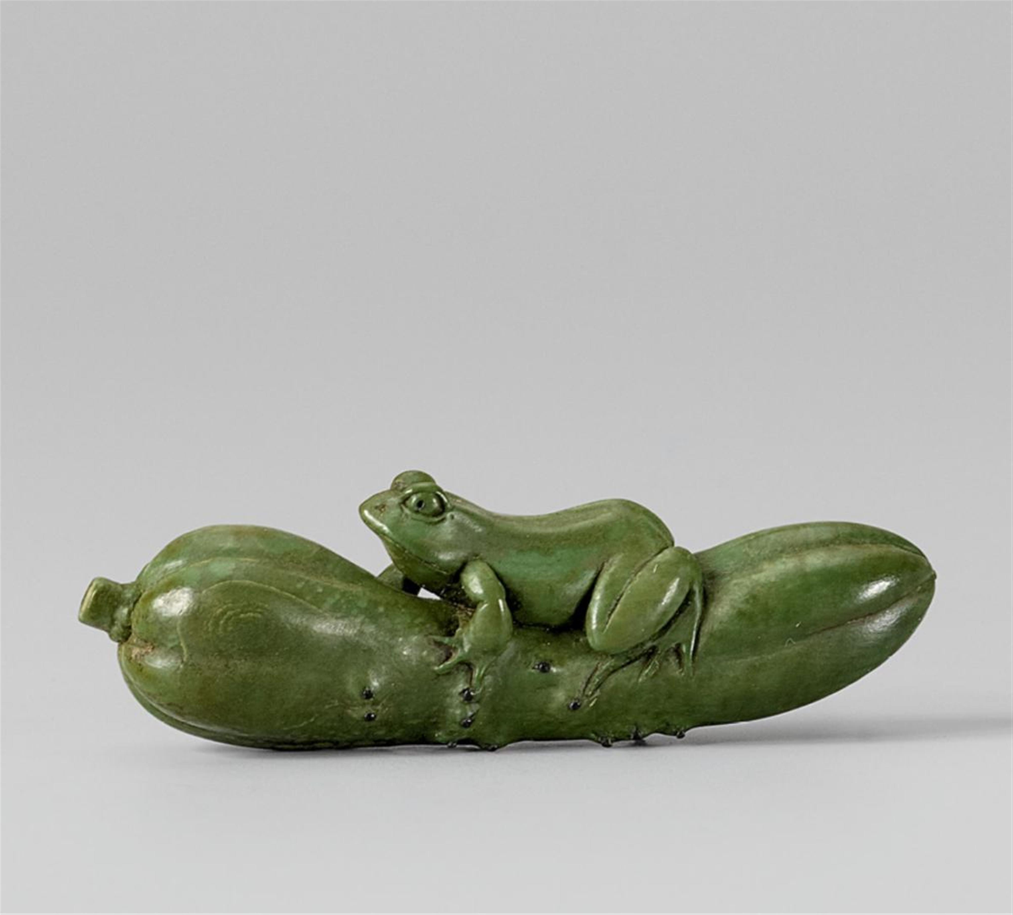A green-stained ivory netsuke of a frog sitting on a cucumber. Second half 19th century - image-1