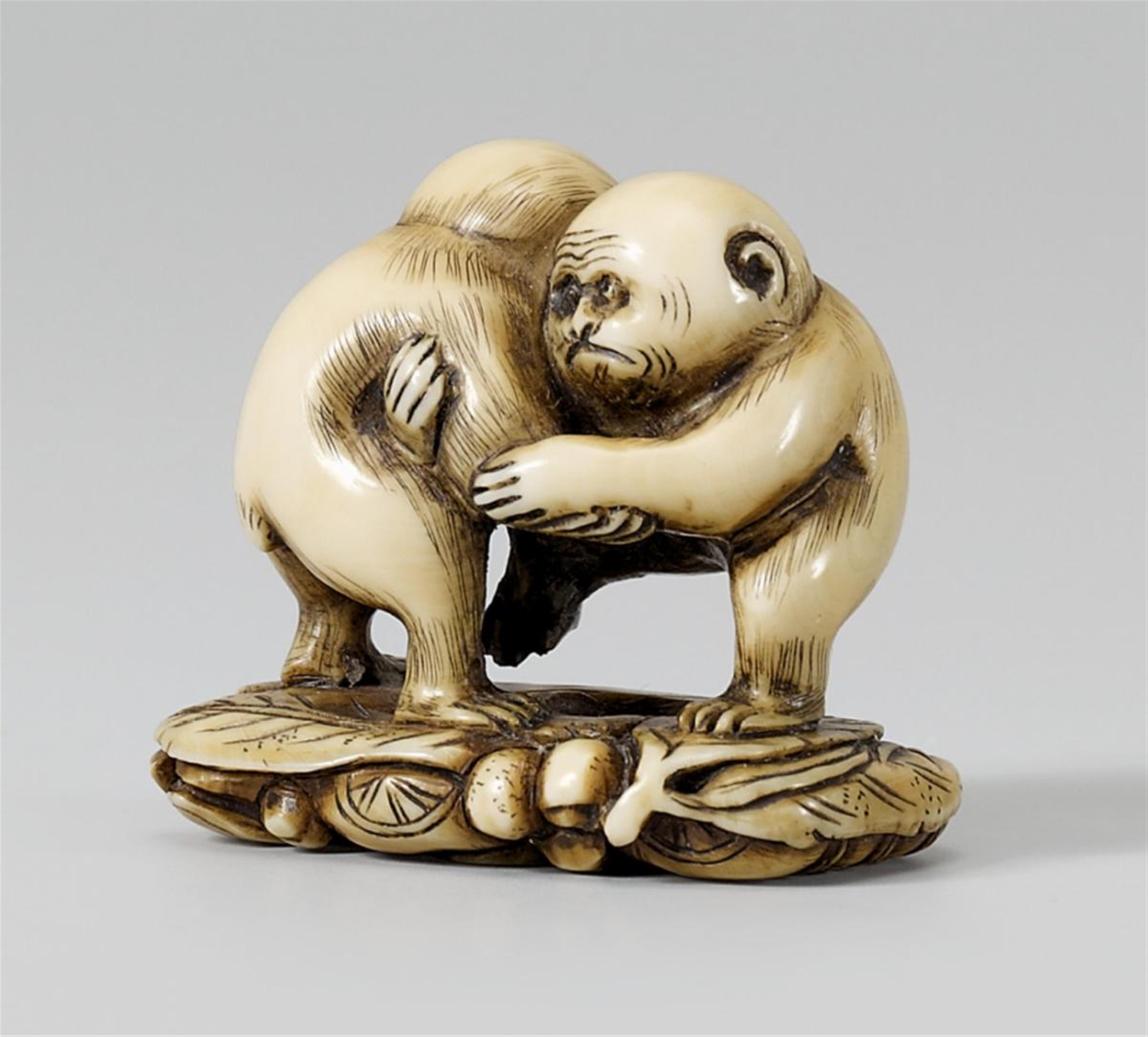 A narwhal tusk netsuke of two wrestling monkeys. Second half 19th century - image-1