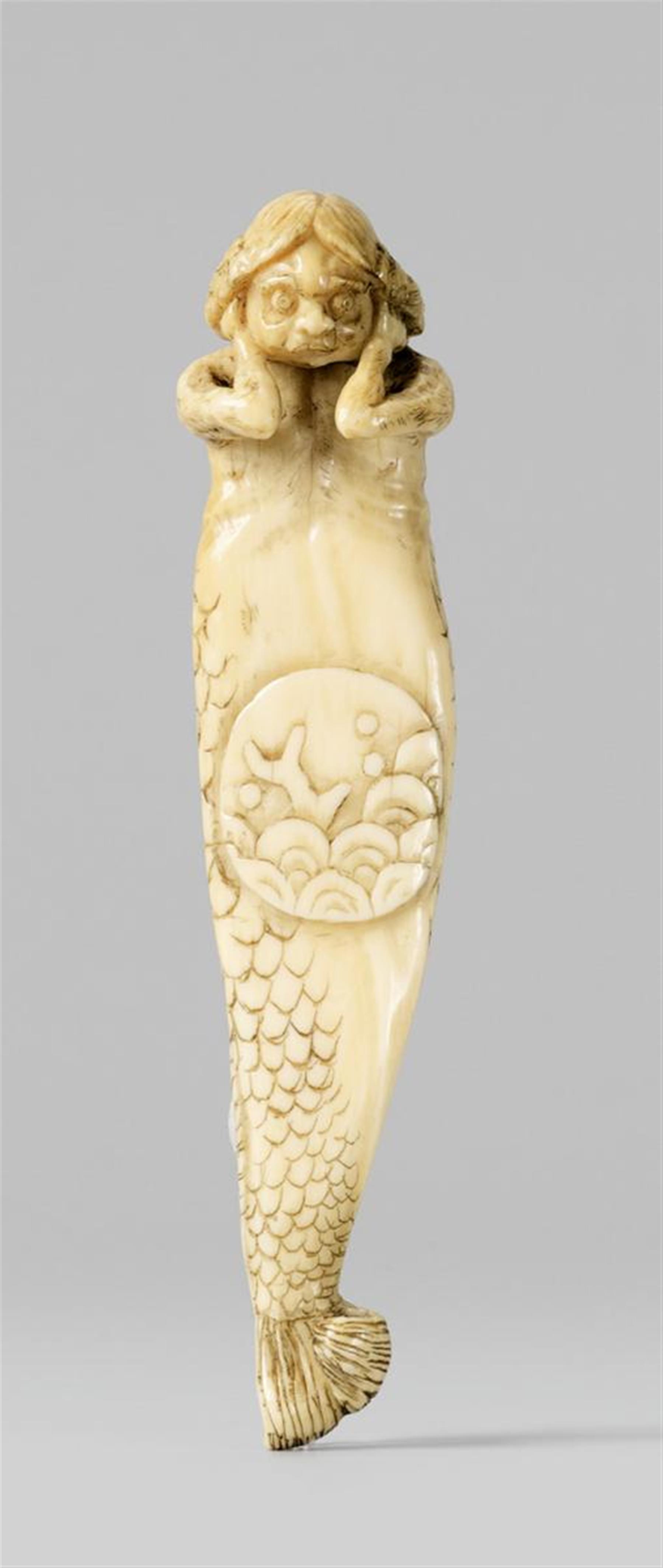 An ivory obi-hasami netsuke of a merman. Late 19th century - image-1