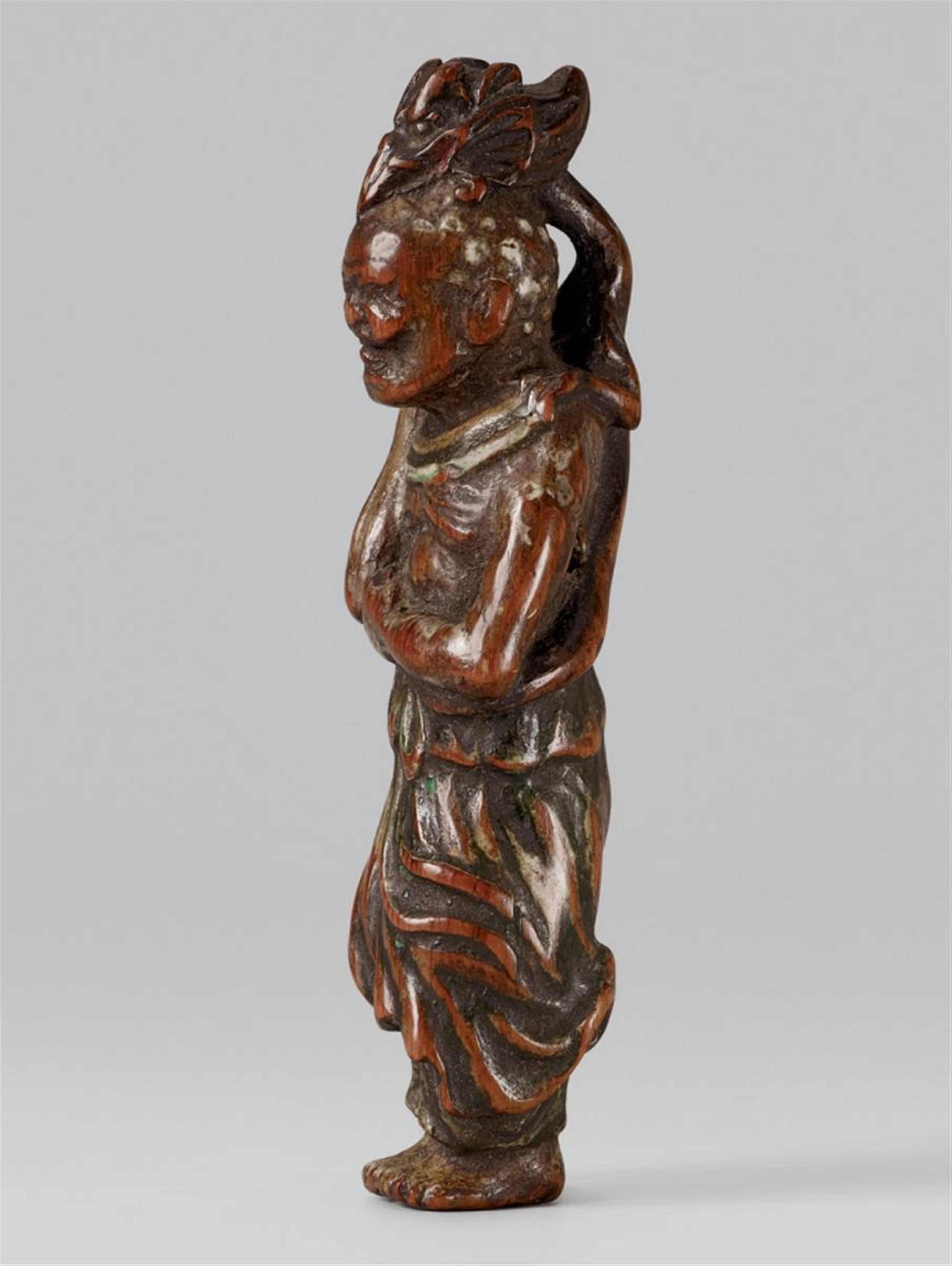 A painted softwood netsuke of Ryûjin’s attendant. 18th century - image-1