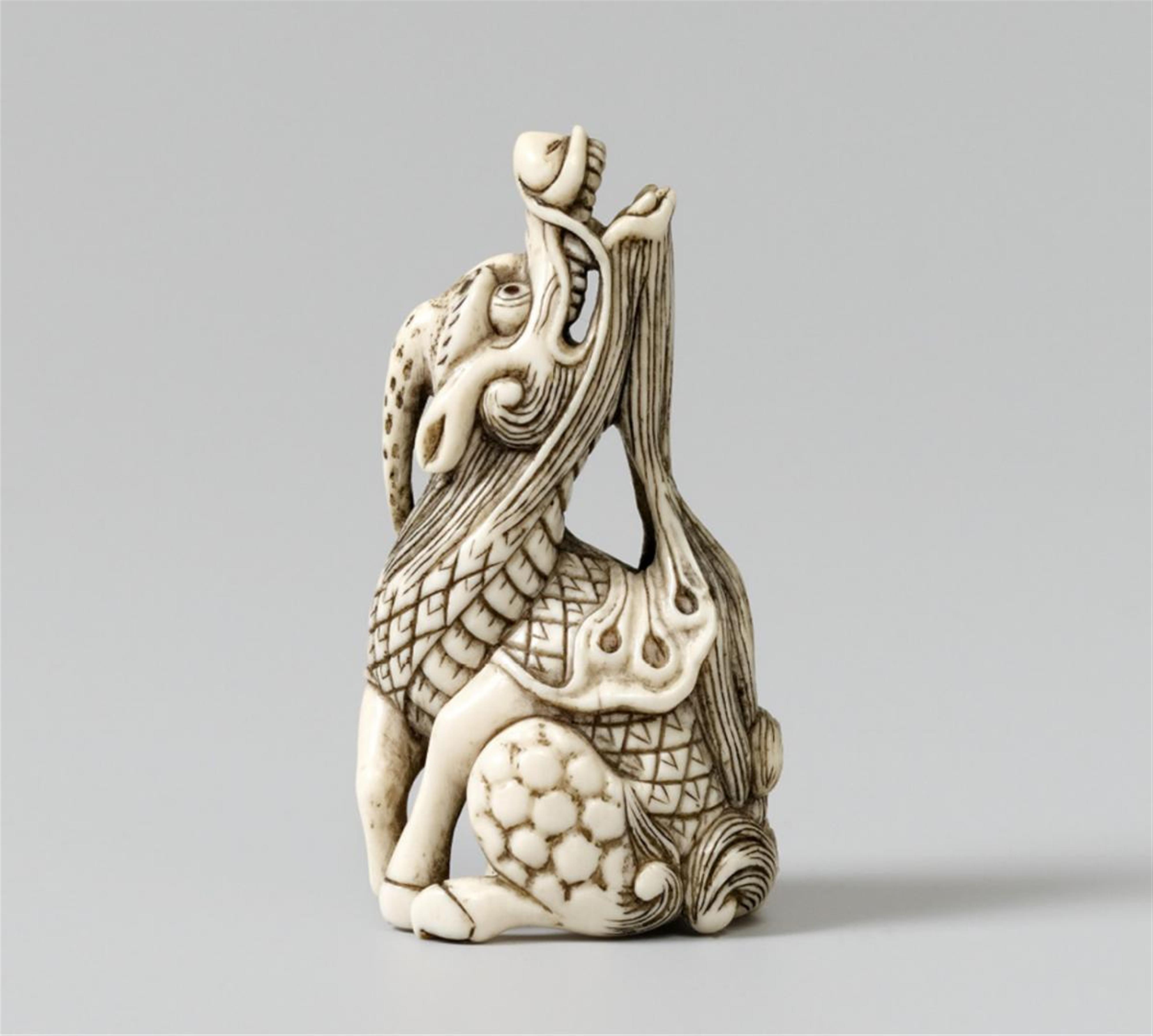 An ivory netsuke of a spirited kirin. Late 18th century - image-1