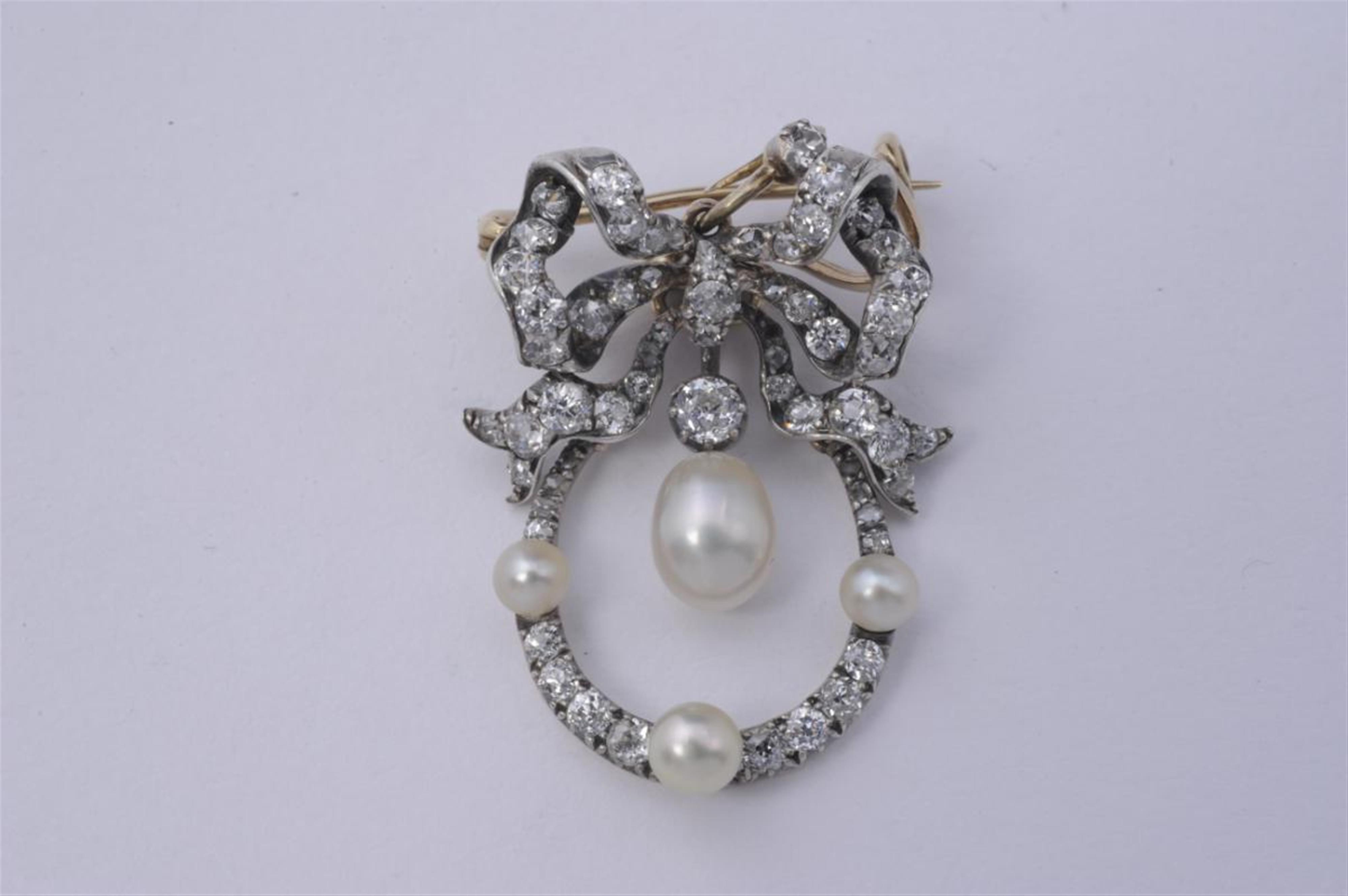 A 14k gold and silver Belle Epoque pendant brooch formed as a wreath. - image-1