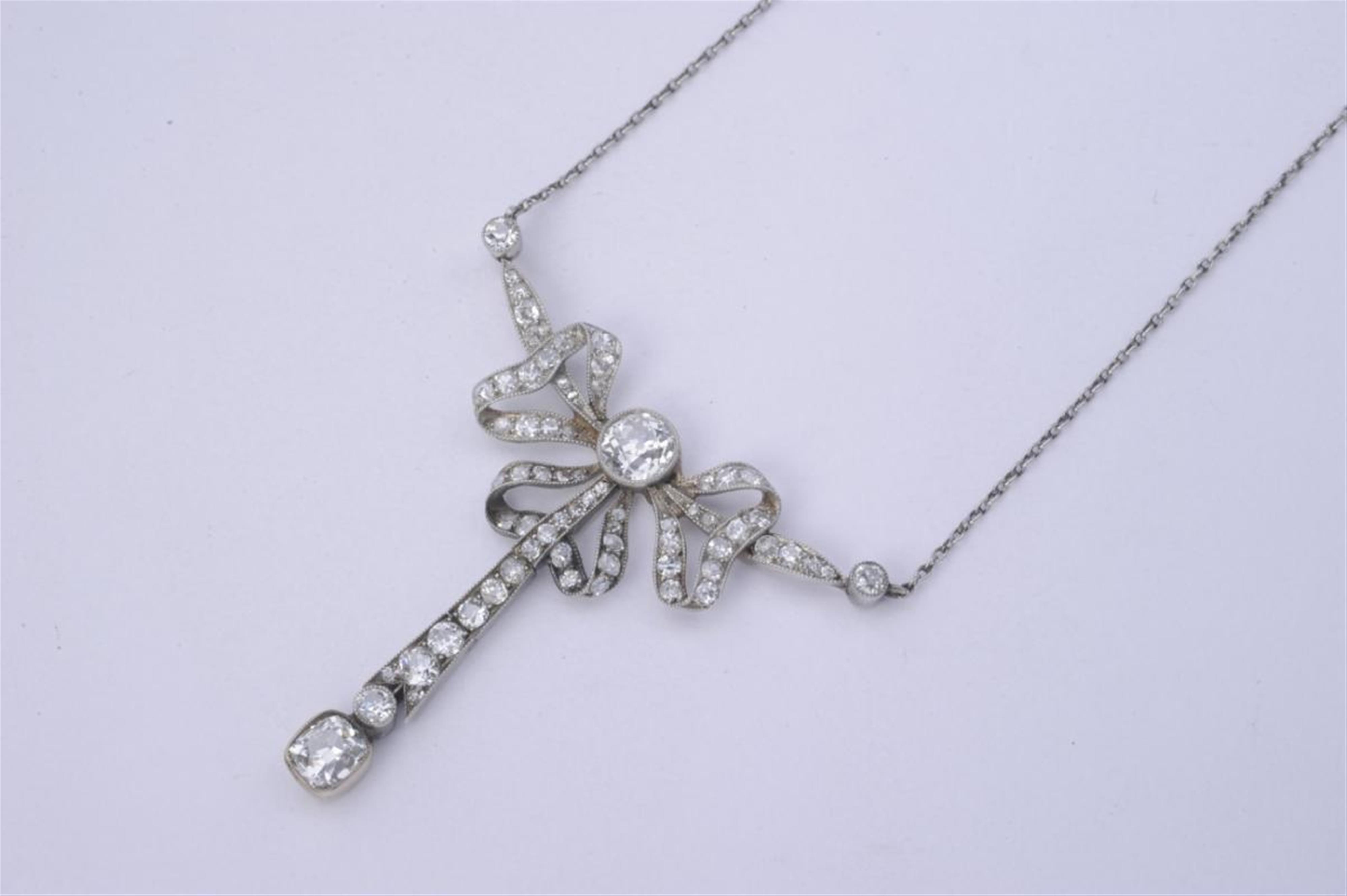 A platinum, white gold and diamond Belle Epoqué collier. - image-1