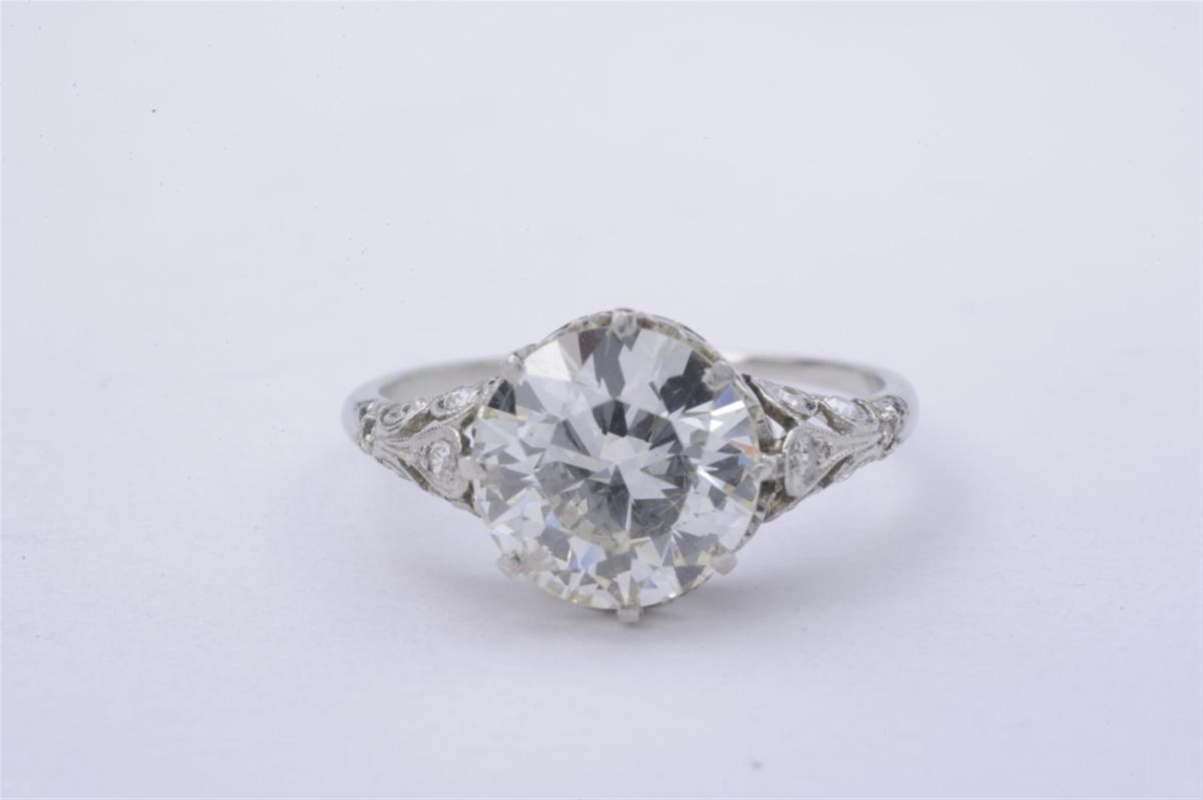 A platinum and diamond single stone Art Déco ring. - image-1