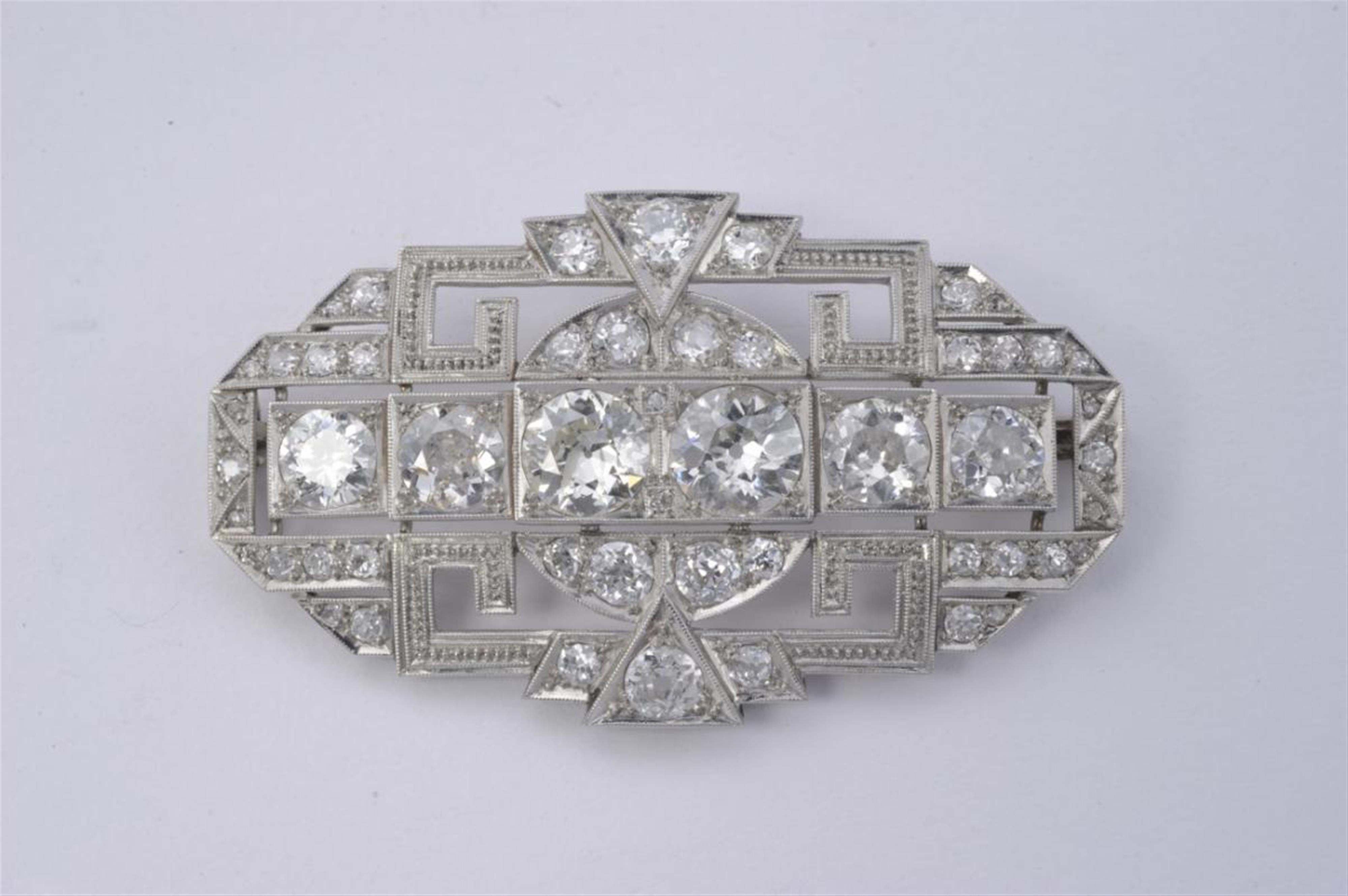 An 14k white gold and diamond openwork Art Déco brooch. - image-1