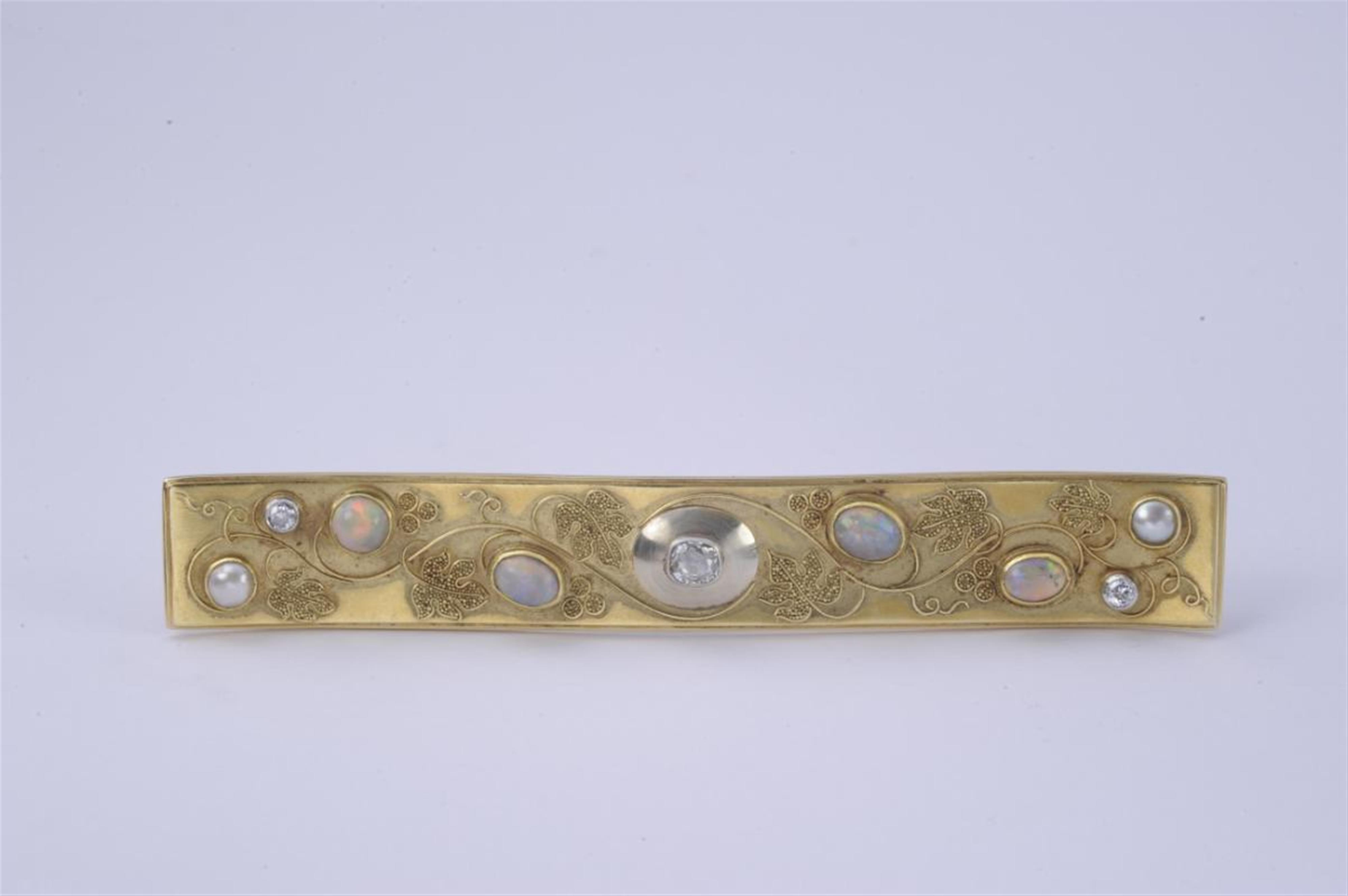 A 14k granulated gold and gem set brooch. - image-1