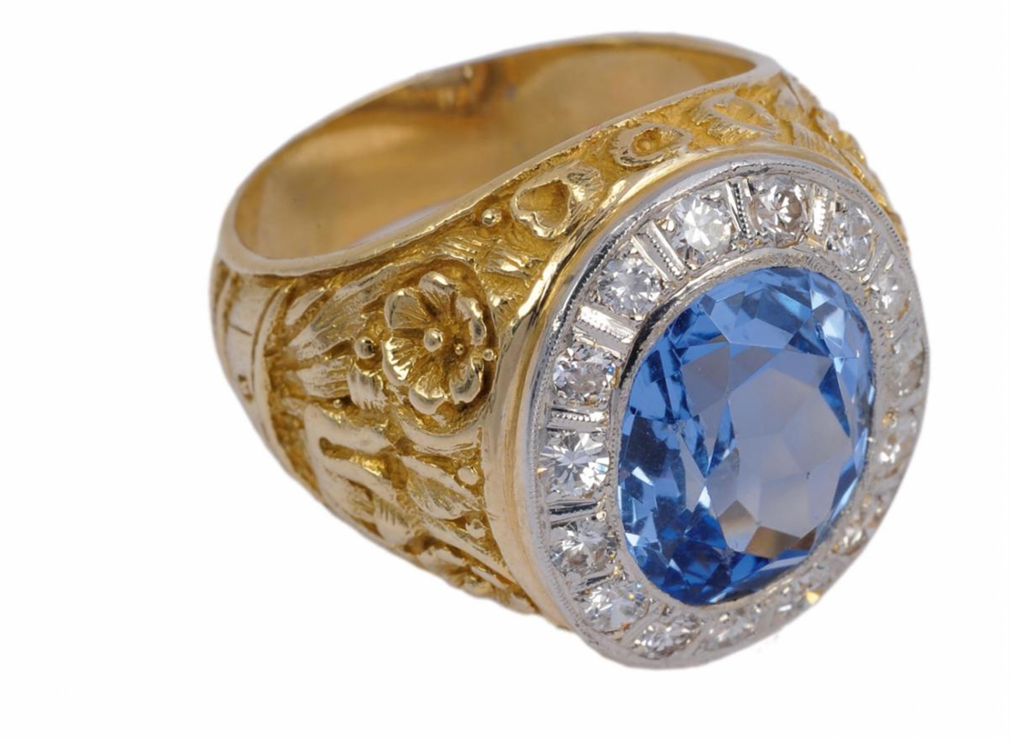 An 18k gold and topaz men's ring - image-1